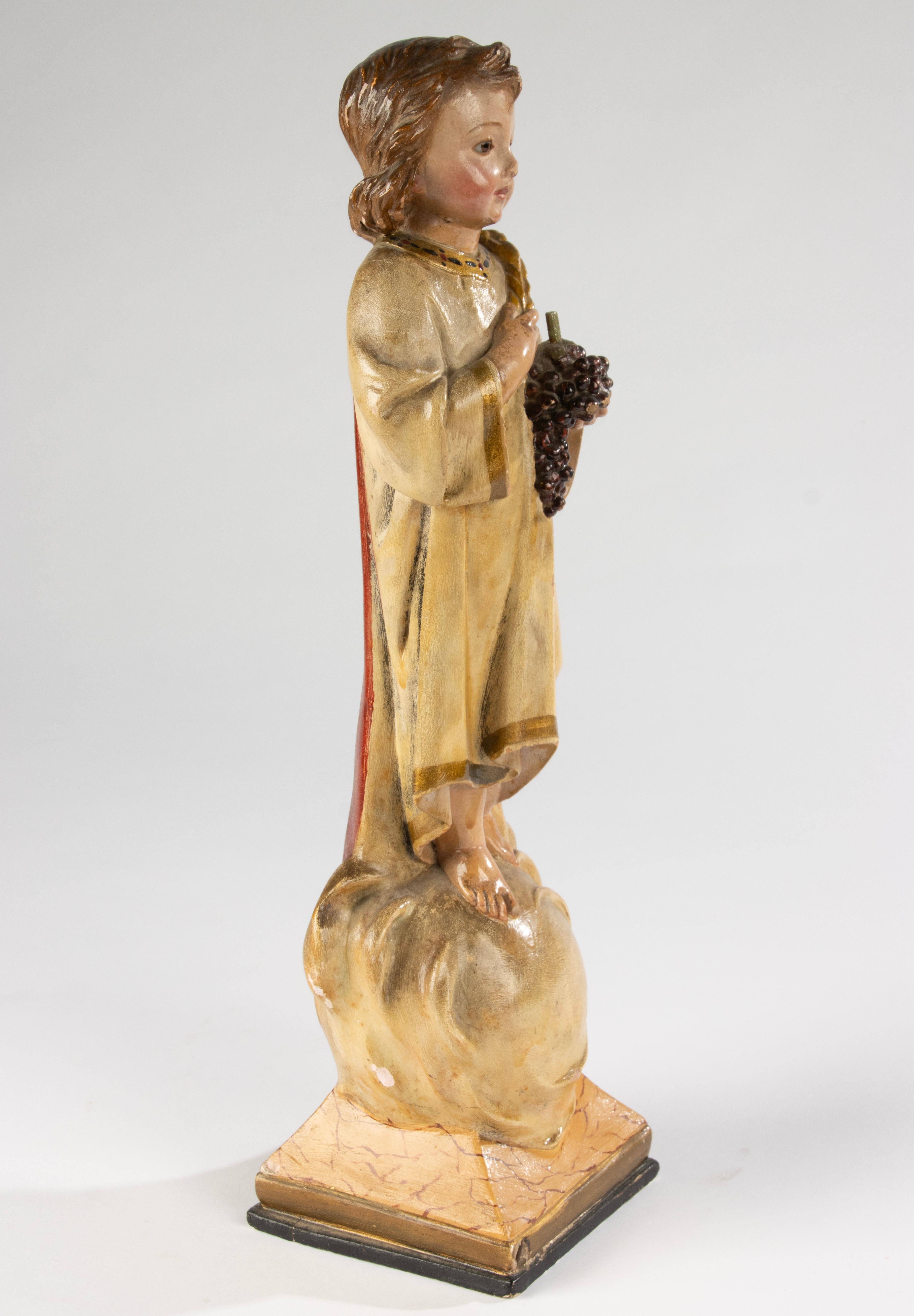 Scultura francese del XIX secolo raffigurante il Bambino Gesù in gesso policromo su legno in vendita 11