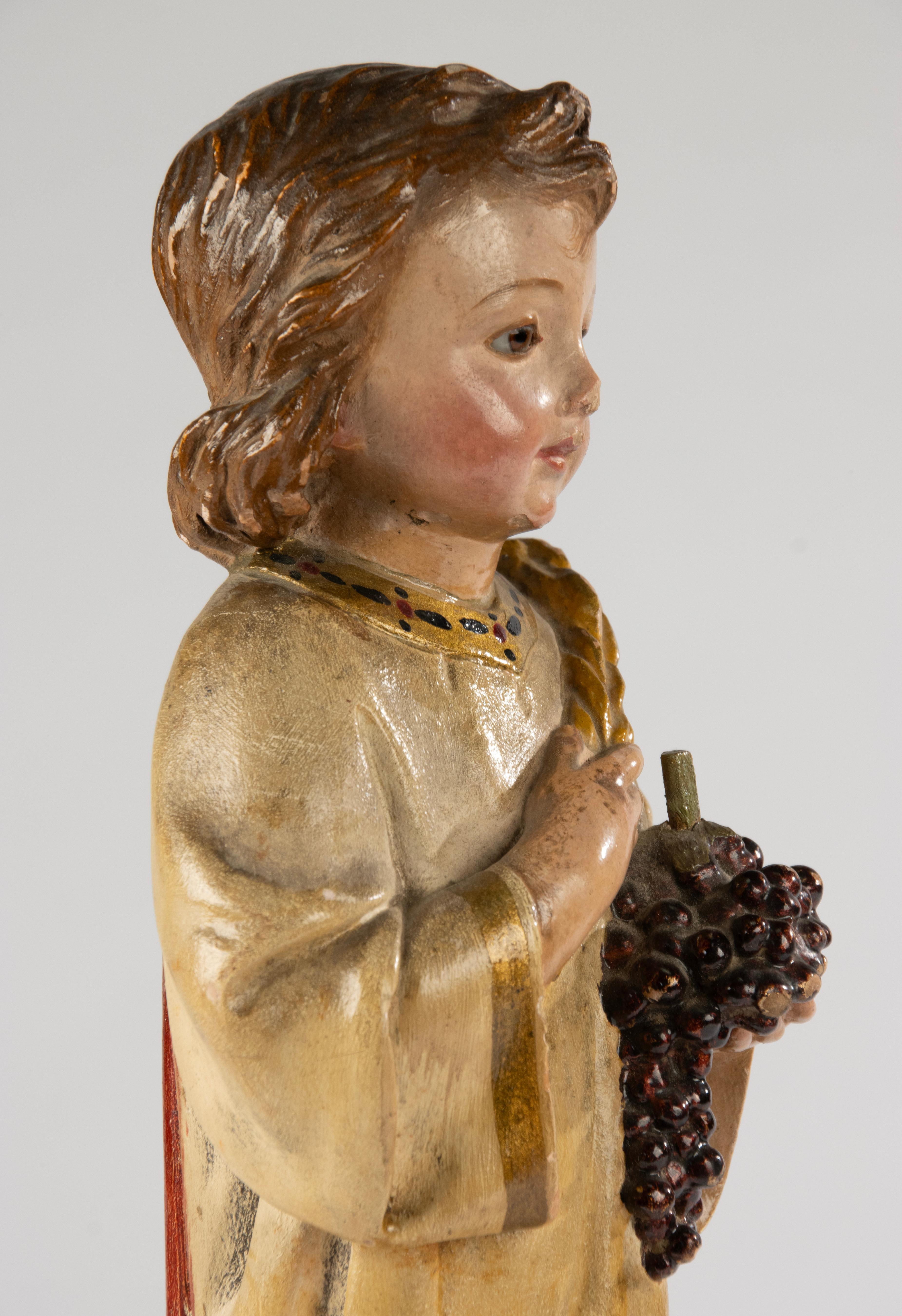 Scultura francese del XIX secolo raffigurante il Bambino Gesù in gesso policromo su legno in vendita 12