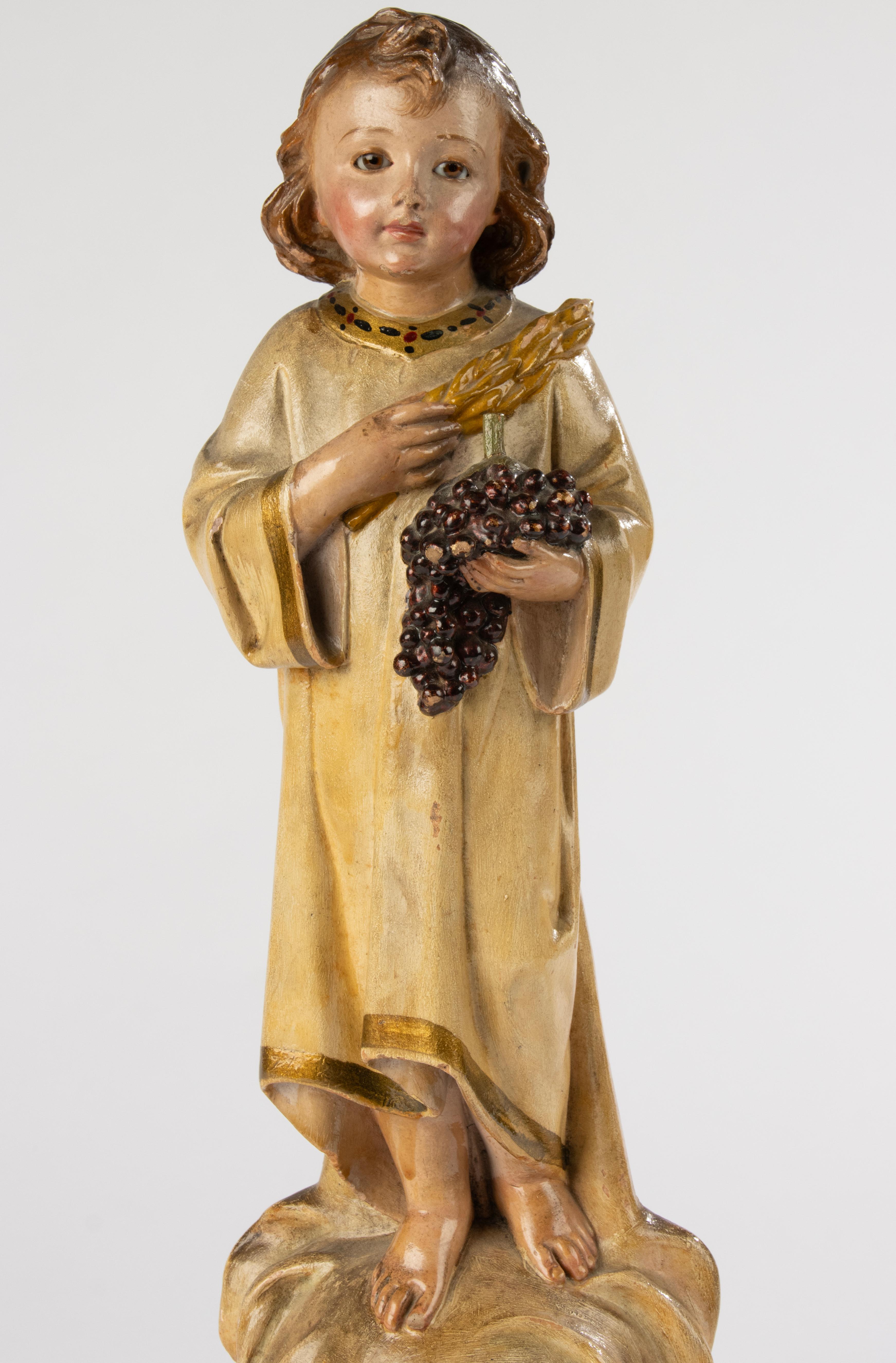 Ceramica Scultura francese del XIX secolo raffigurante il Bambino Gesù in gesso policromo su legno in vendita