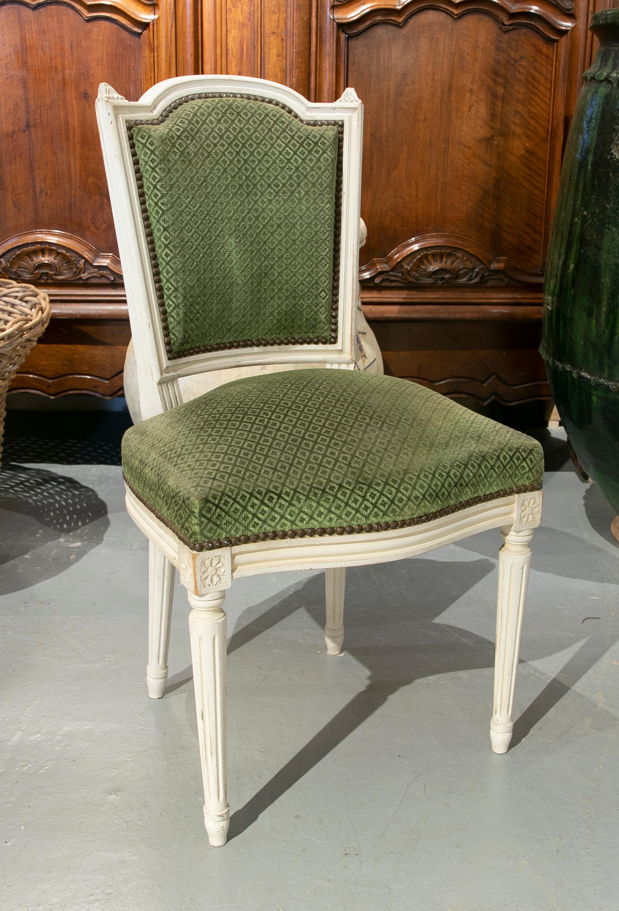 19th Century French set of six wooden chairs upholstered in green.