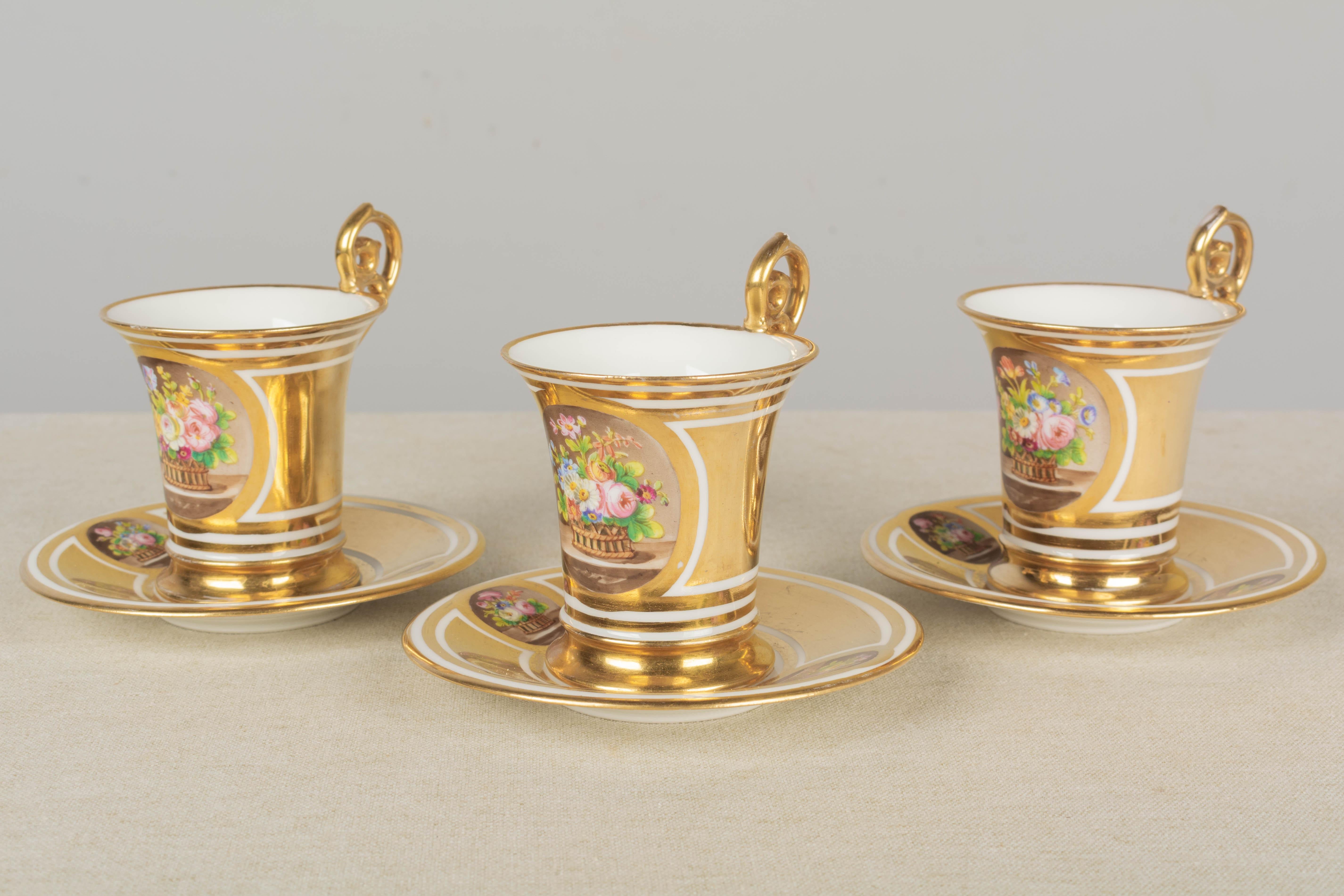 Beaux Arts 19th Century French Sèvres Gilt Porcelain Cup & Saucer, Set of 3 For Sale