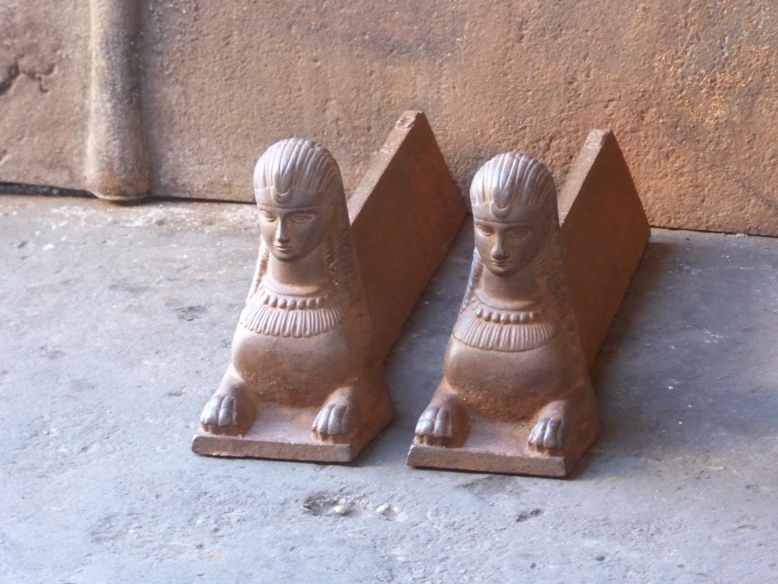 19th century French Empire andirons with sfinx. The andirons are made of cast iron and have a natural brown patina. Upon request they can be made black / pewter. They are in a good condition.
