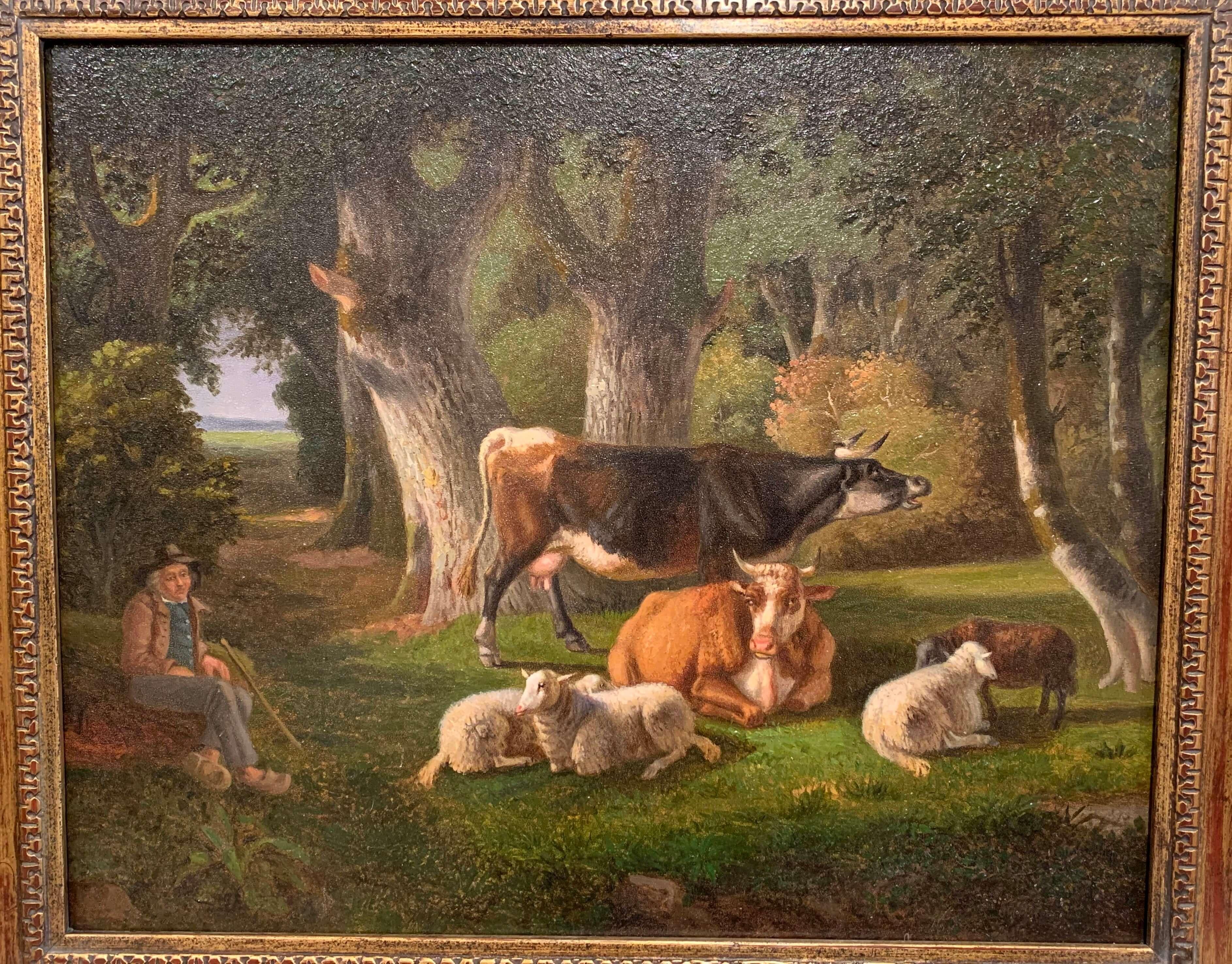 This elegant animal painting was created in France, circa 1880. The bucolic, countryside painting is set in a carved gilt frame and depicts a pastoral scene with cows and sheep resting with a shepherd looking on. The painting is a beautiful example
