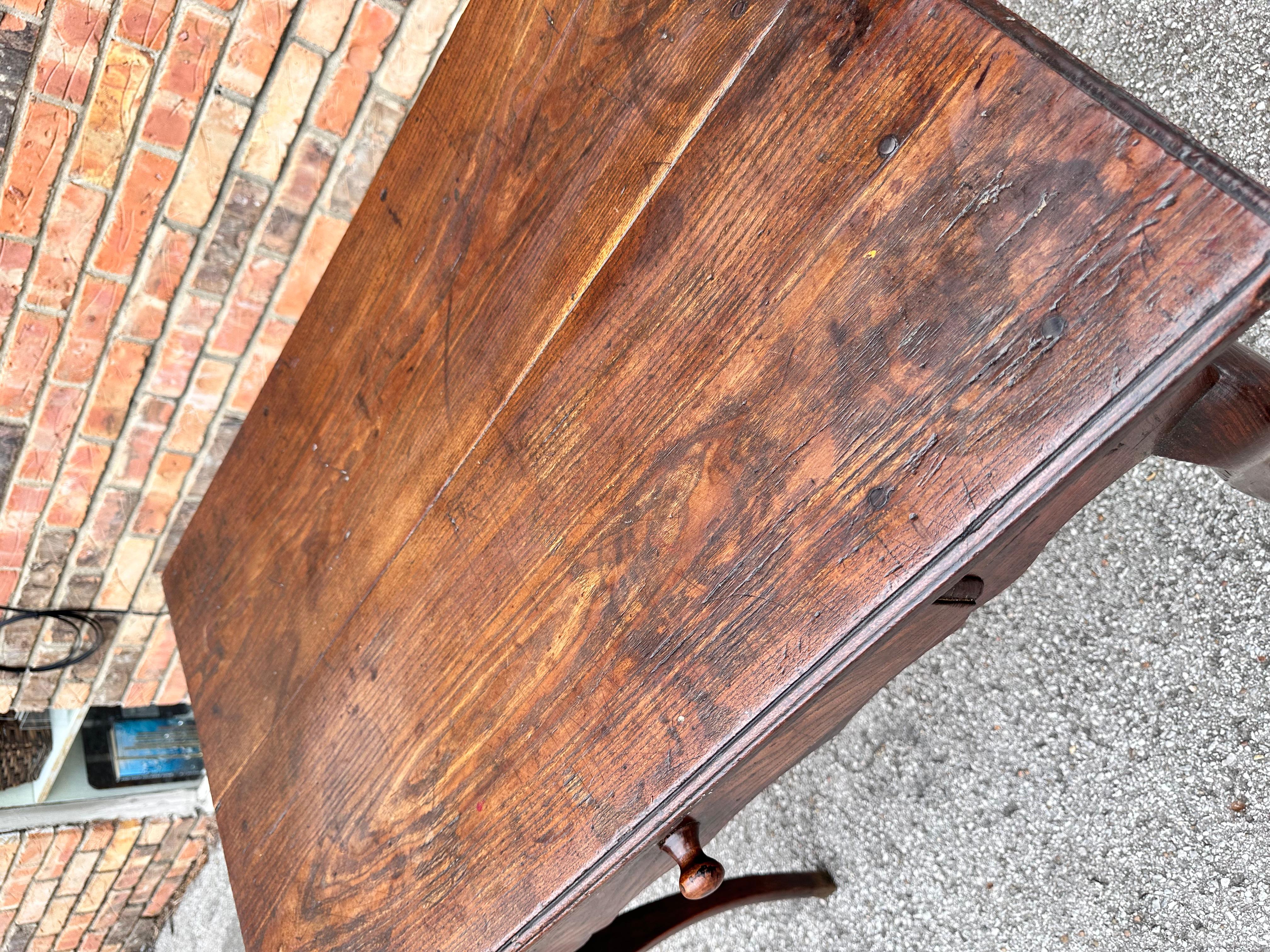 This is a beautiful French side table! The color and patina of this piece is amazing! Notice the beauty of the curved legs as they taper into the dainty feet. This piece would make an excellent side table but could also be used as a small desk!#887