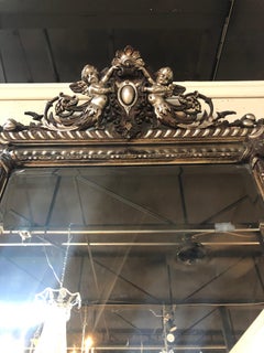19th Century French Silver Leaf Cushion Mirror with Cherubs