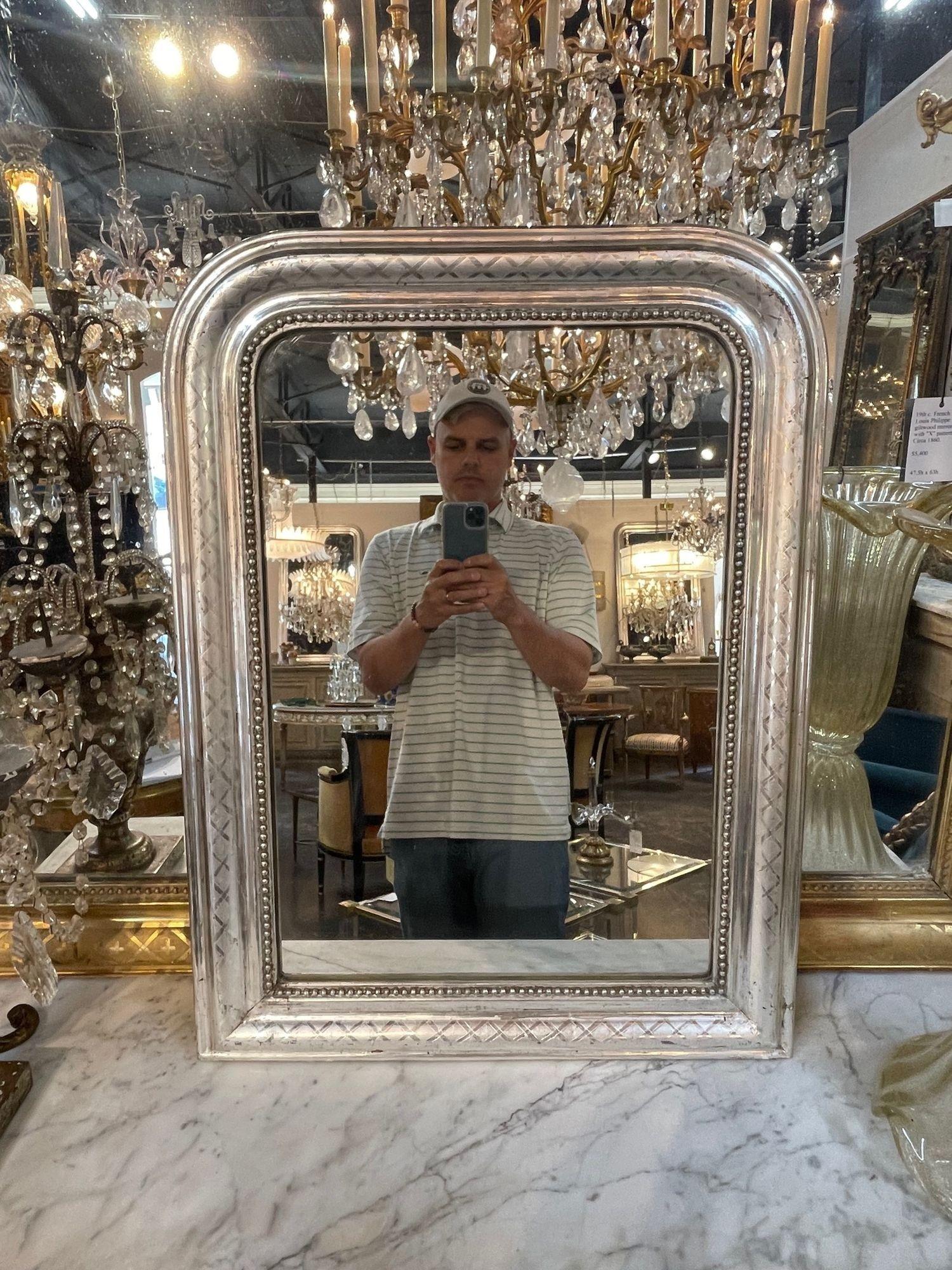 Very fine 19th century French silver leaf Louis Philippe mirror with X pattern. Very fine quality. Great for a powder room! So pretty!