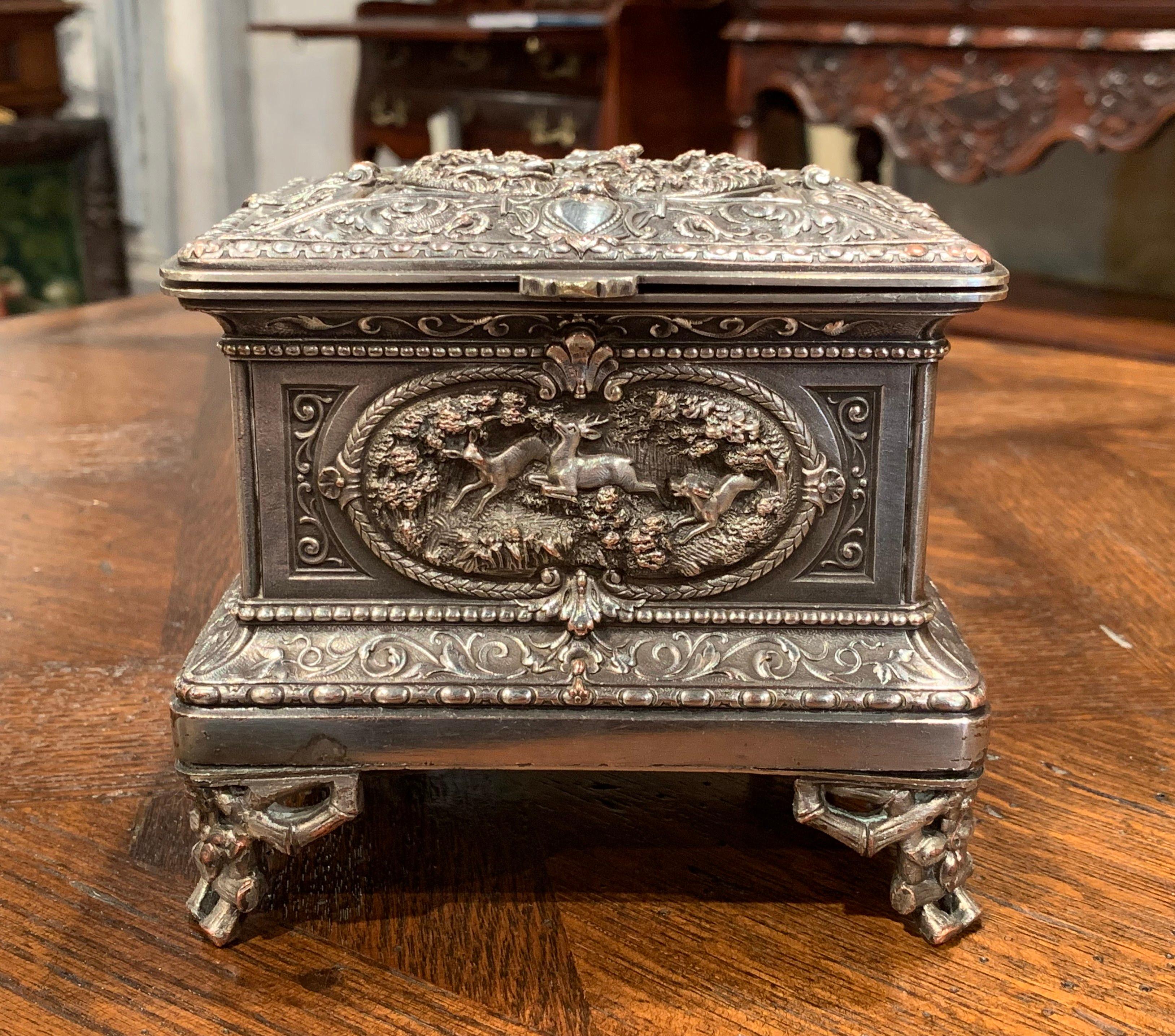 Place this elegant, antique Napoleon III copper box in your master bath to keep your jewelry safe and organized. Crafted in France circa 1880, the ornate square casket sits on four scroll feet, and all five sides including the top are embellished