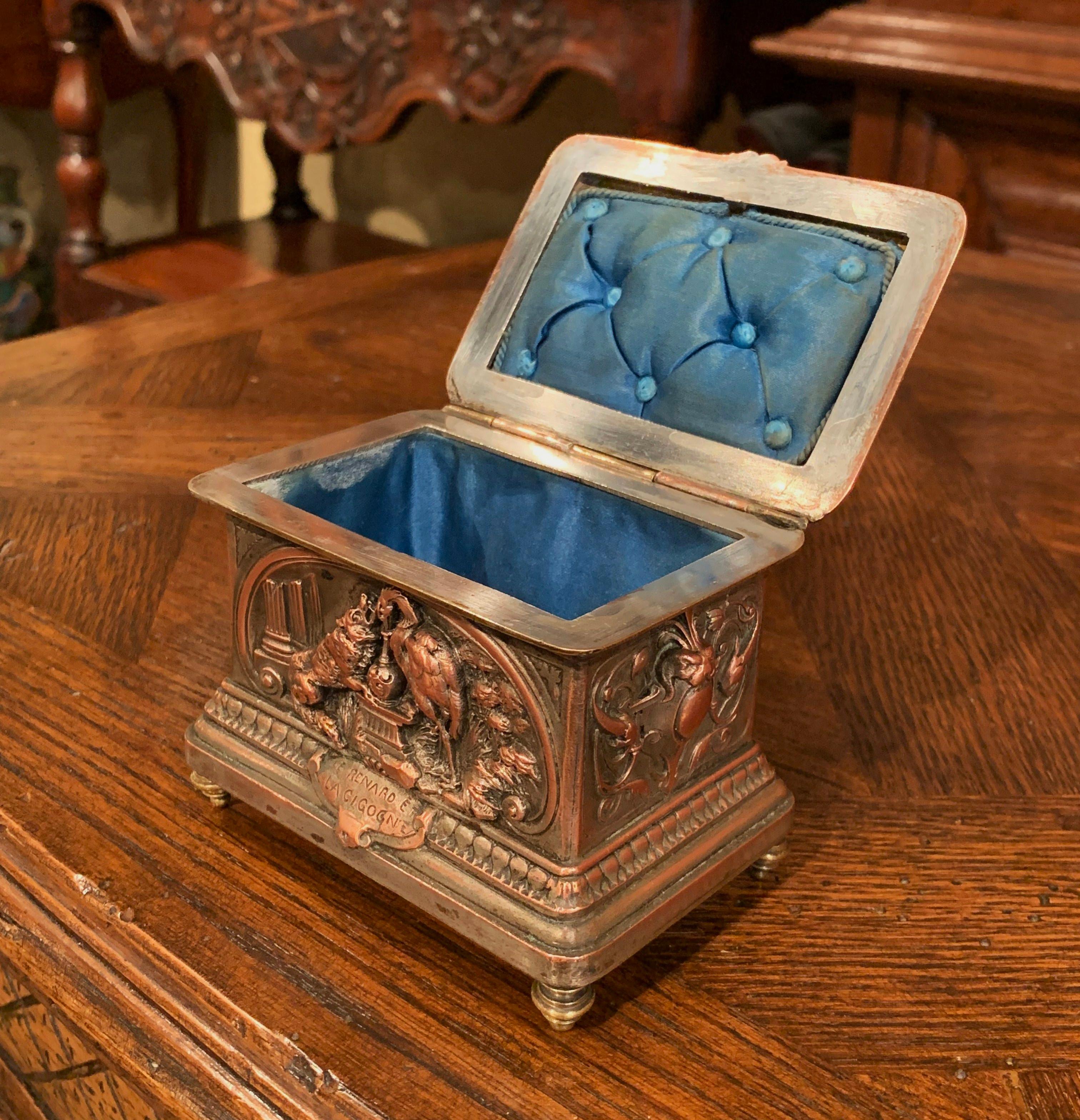 Place this elegant, antique Napoleon III copper box in your master bath to keep your jewelry safe and organized. Crafted in France, circa 1880, the petite casket sits on four small feet, and has three sides that feature 
