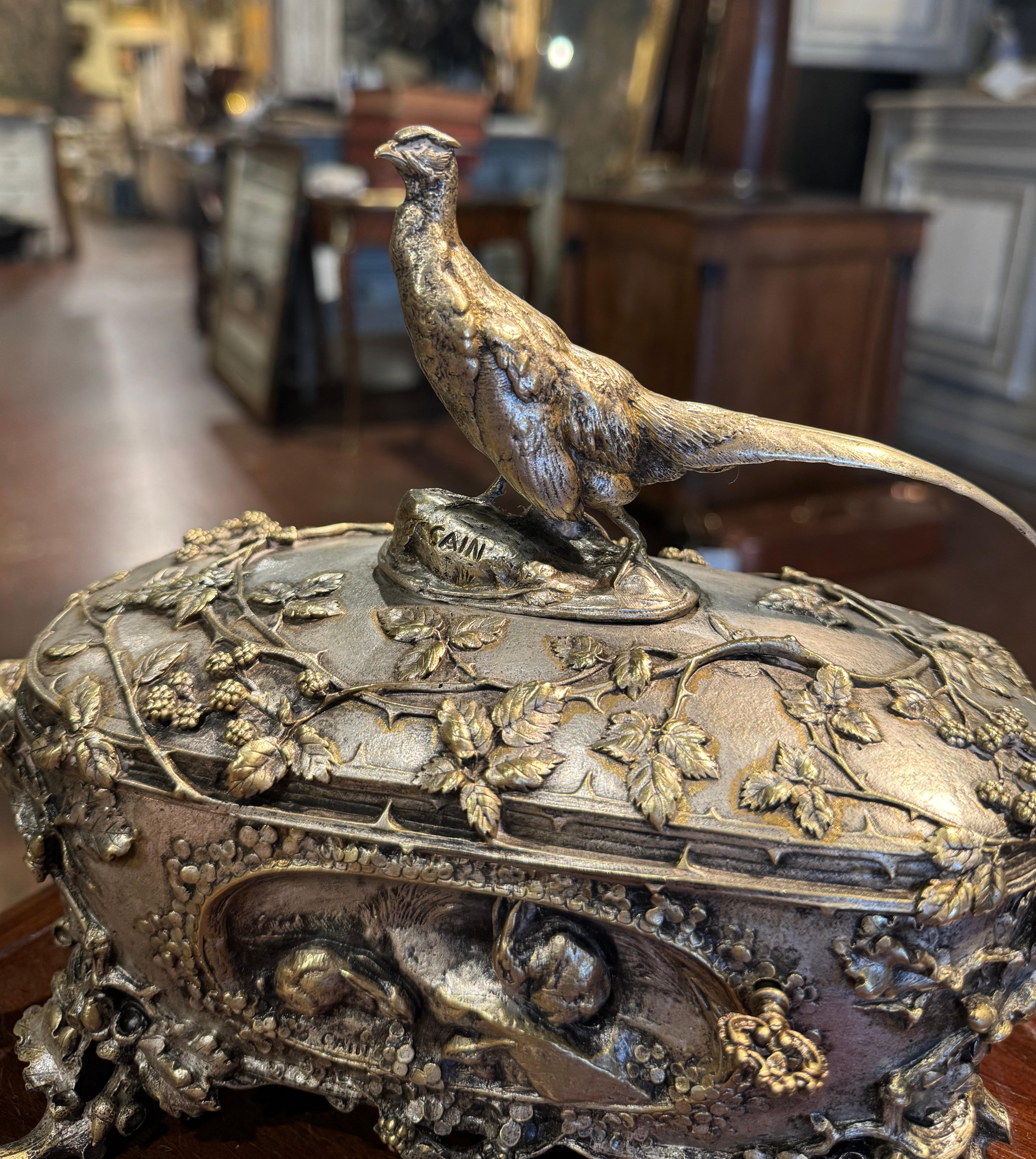 Decorate a shelf or a lady's bathroom counter with this exquisite jewelry case box. Crafted in France circa 1880 and oblong in shape, the bronze casket stands on openwork plant form bracket feet, and is dressed with tree branch form side handles.