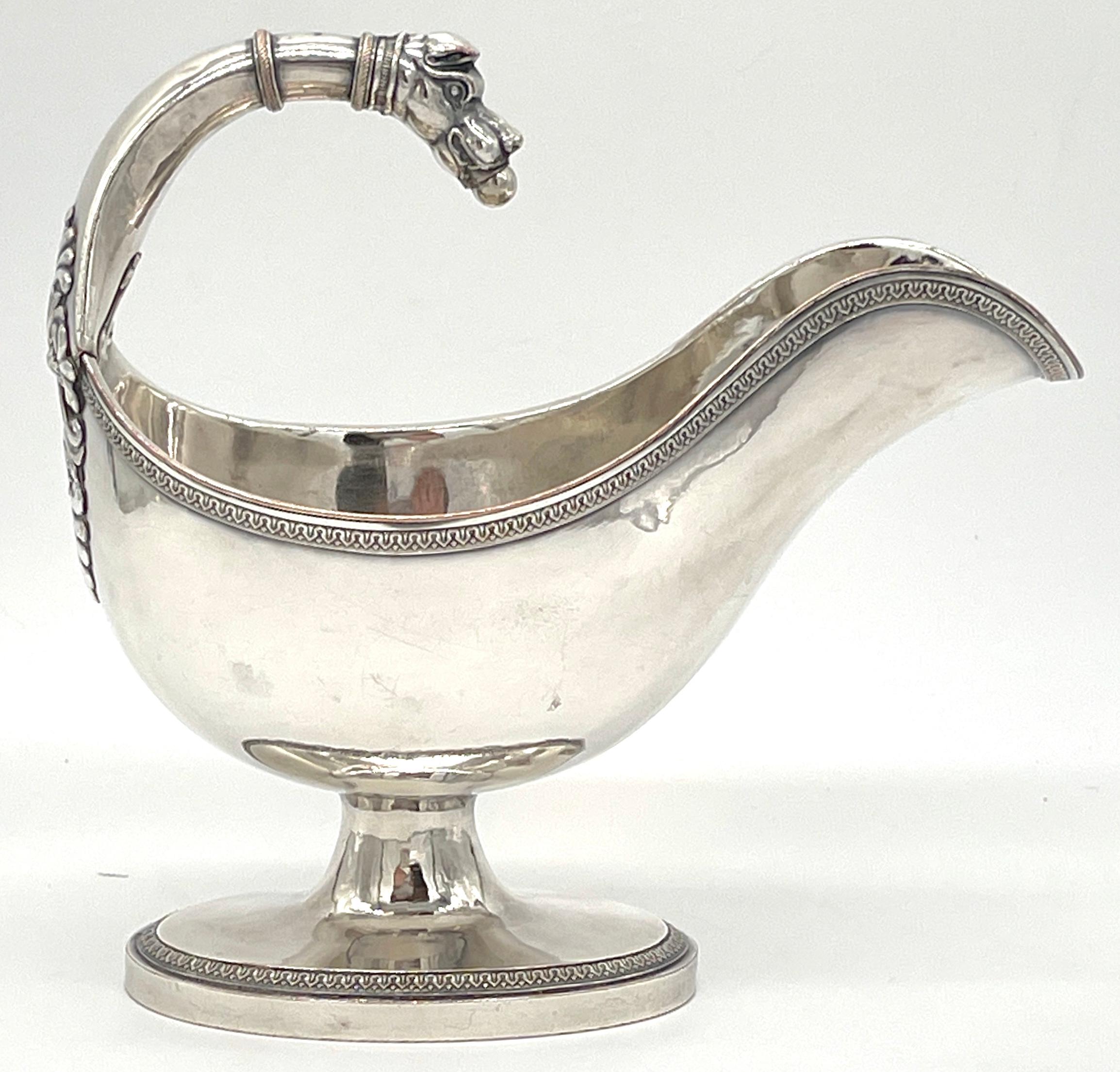 19th Century French Silverplated Christofle Style Dog Motif Gravy/ Sauce Boat
Bearing Hallmarks, Possibly French , Mid 19th Century 

This restrained elegant 19th Century French silverplated Christofle style dog motif gravy/sauce Boat, reflects the