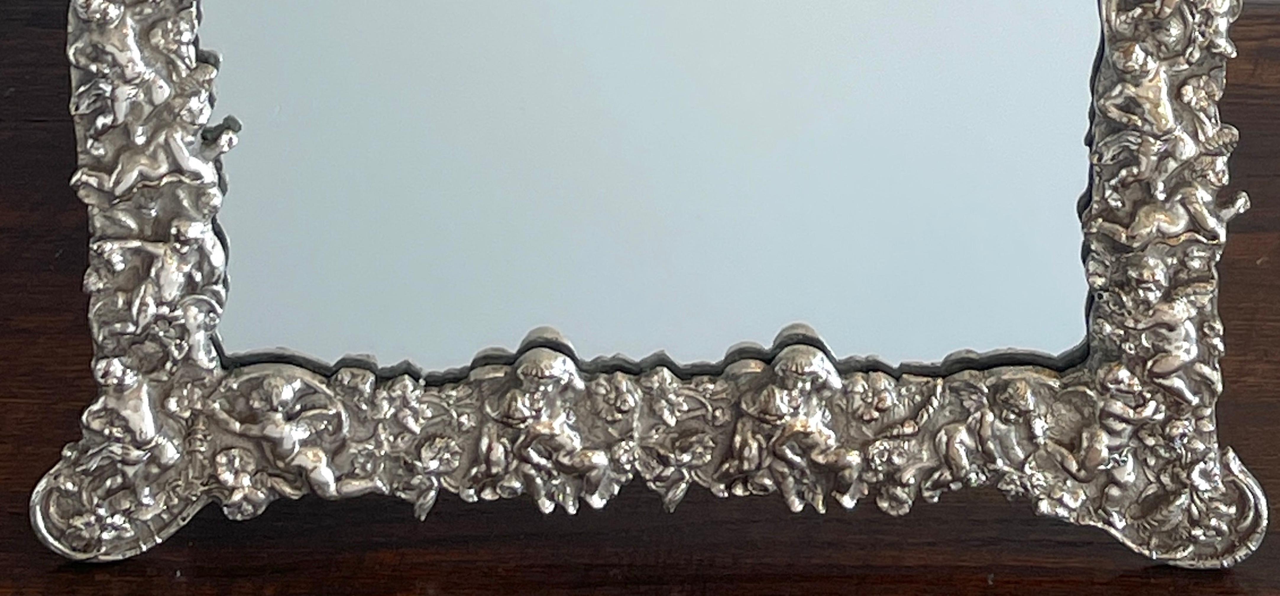 Silver Plate 19th Century French Silverplated Putti Motif Dressing Mirror For Sale