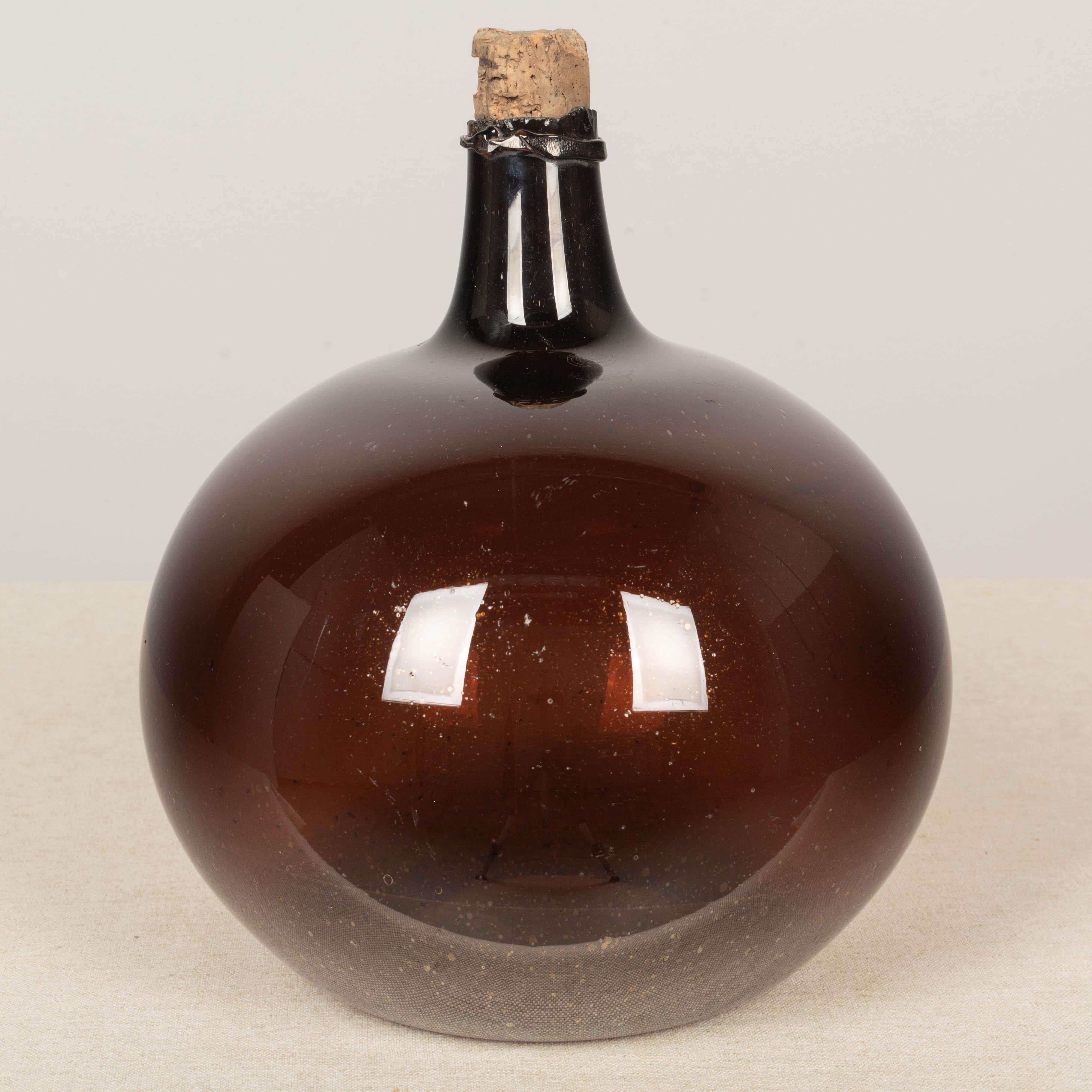 19th Century French Small Amber Glass Demijohn Bottle In Good Condition In Winter Park, FL
