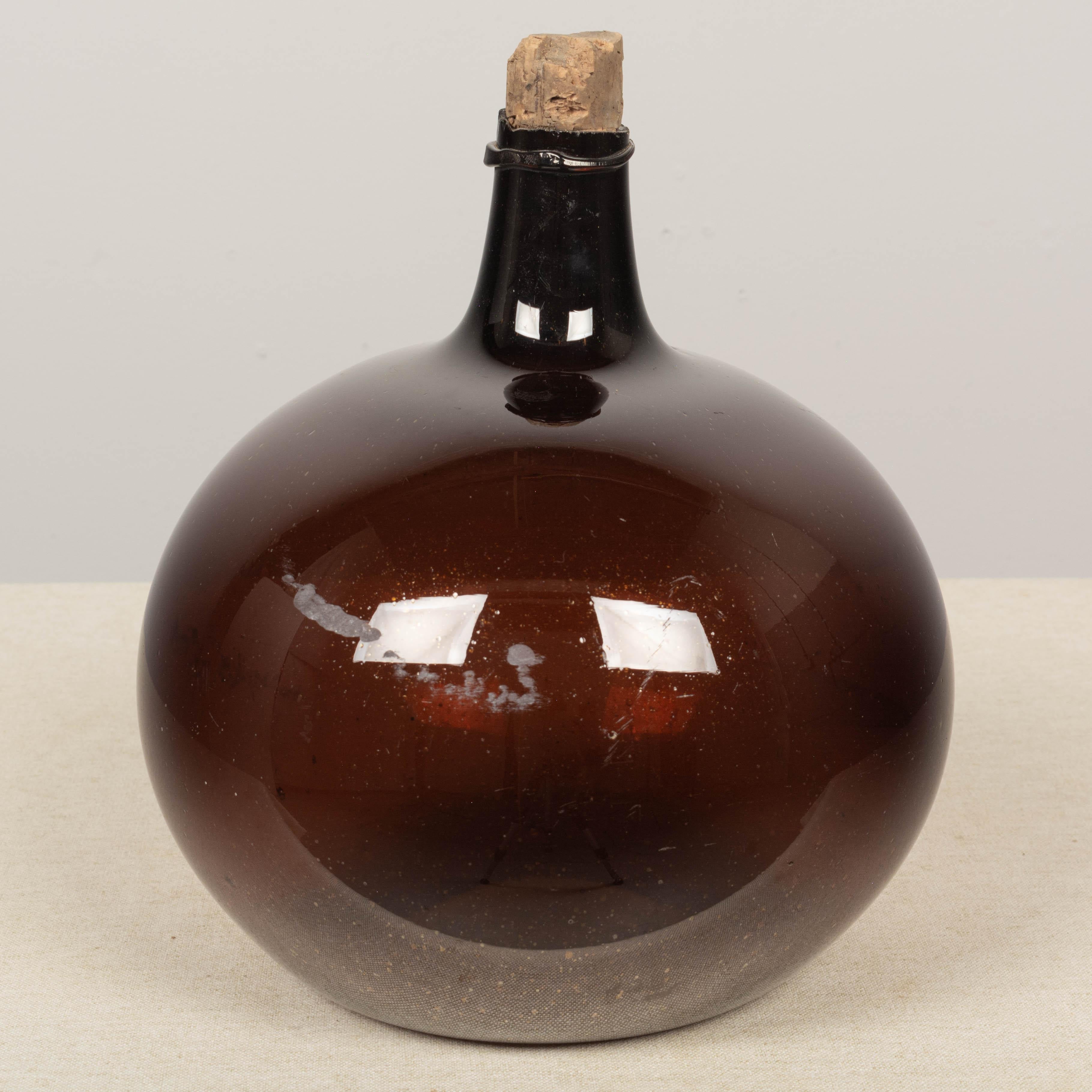 19th Century French Small Amber Glass Demijohn Bottle 1