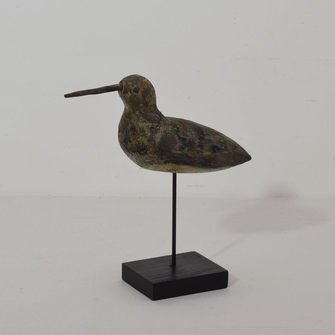 Great snipe decoy,
France, circa 1850-1900
Weathered and losses.
Measurement includes the wooden base.
  
