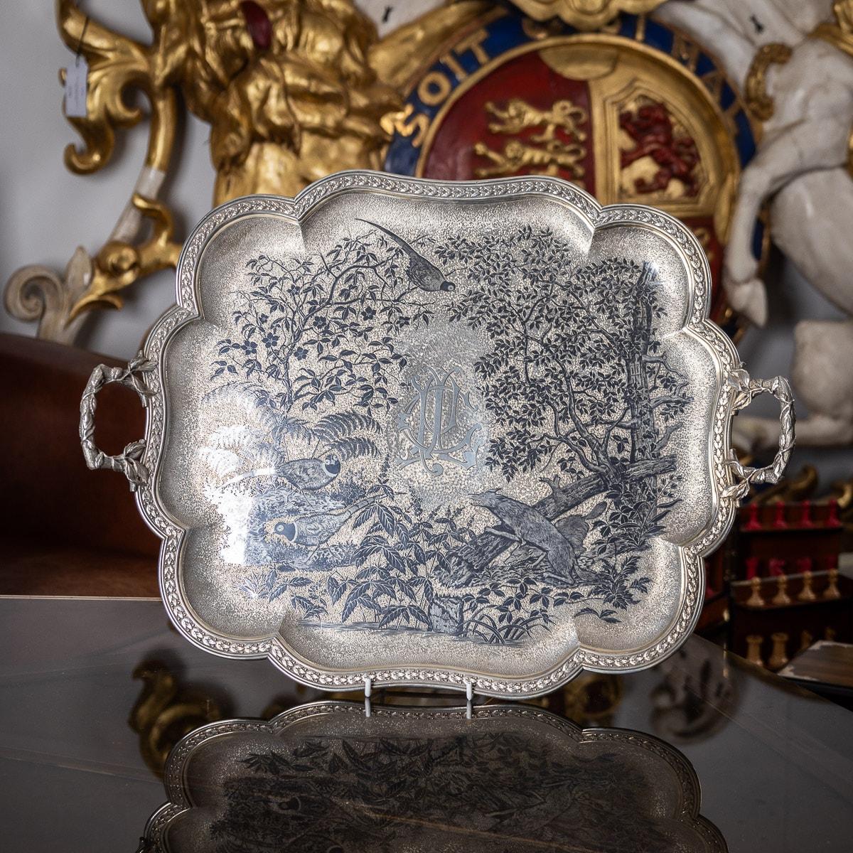 Antique 19th century French very rare and exceptional quality solid silver & niello serving tray, of shaped oblong form, the boarder beautifully decorated with laurel leaves and applied with realistically modeled branch handles, the center engraved