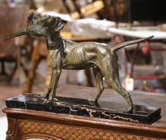 Perro y pájaro de caza franceses de espelta del siglo XIX sobre base de mármol Firmado C. Masson