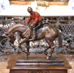 Sculpture en fonte française du 19e siècle représentant un jockey à cheval, signée P.J. Mène