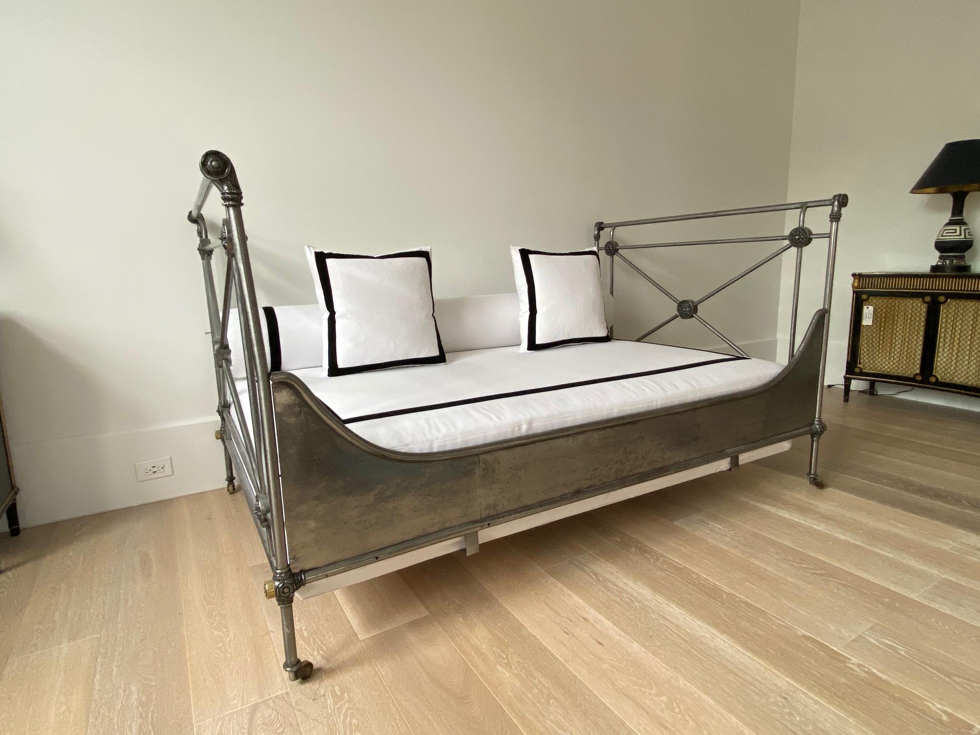 19th century French steel Campaign daybed with X form stretchers at both ends.