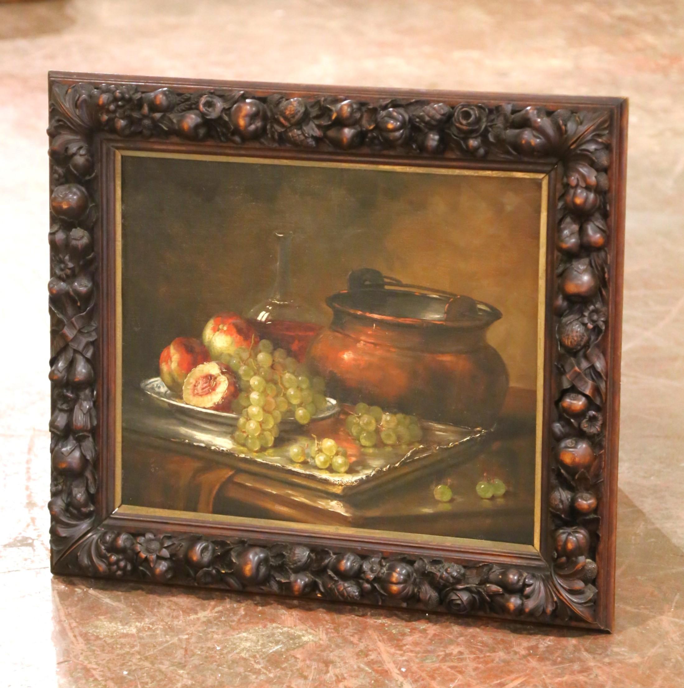 This refined 19th-century French still life painting captures a richly composed arrangement of ripe fruit and kitchenware, rendered with classical precision and dramatic lighting. At the heart of the composition, a lustrous copper pot sits beside a