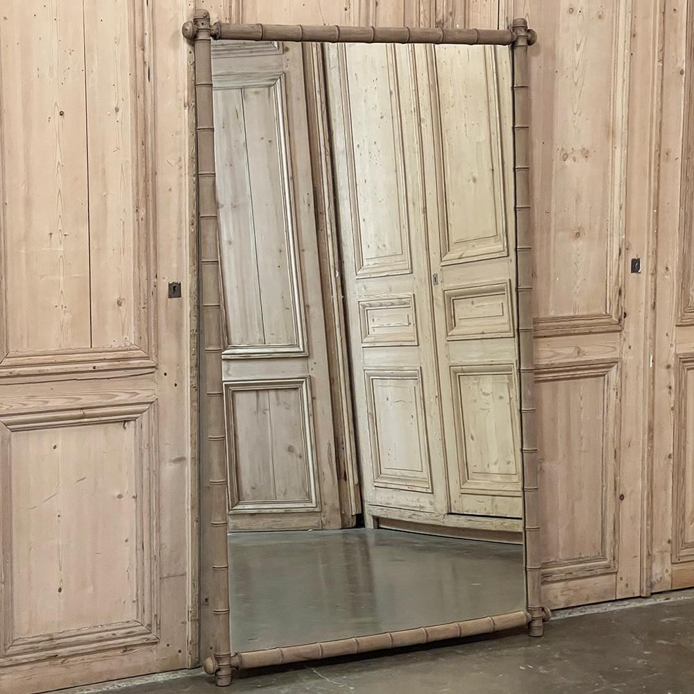 19th Century French Stripped Faux Bamboo Mirror is an excellent choice for a large space with a casual flair!  Hand-crafted from maple wood to resemble stalks of bamboo, it features a tailored look that is at once stylish yet relaxed.  Called the