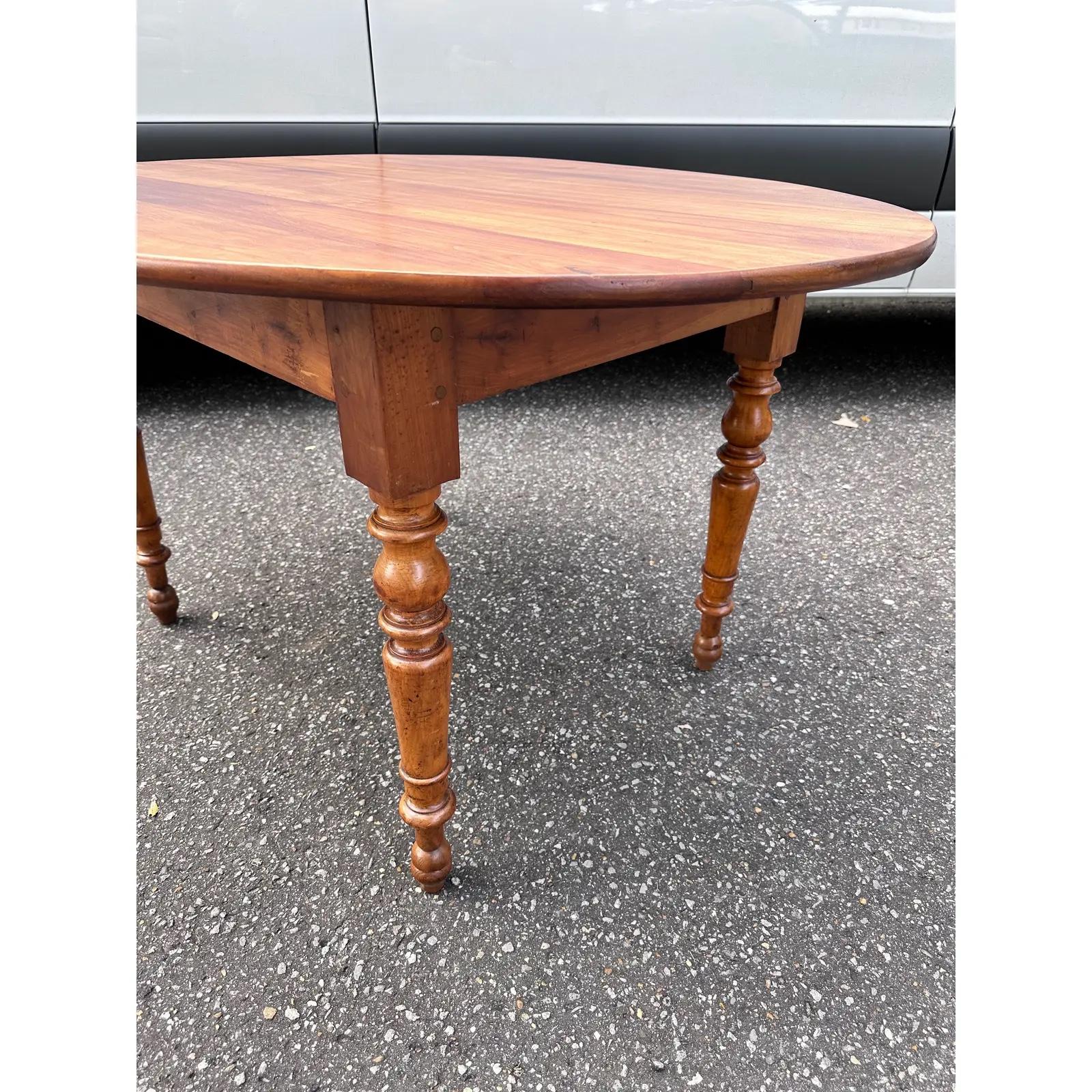 This is a lovely little French table! The wood is a warm vibrant honey hue with just a hint of red. The piece boasts beauty in simplicity with a smooth top that lets the natural beauty of the wood speak for itself. The legs feature some simple