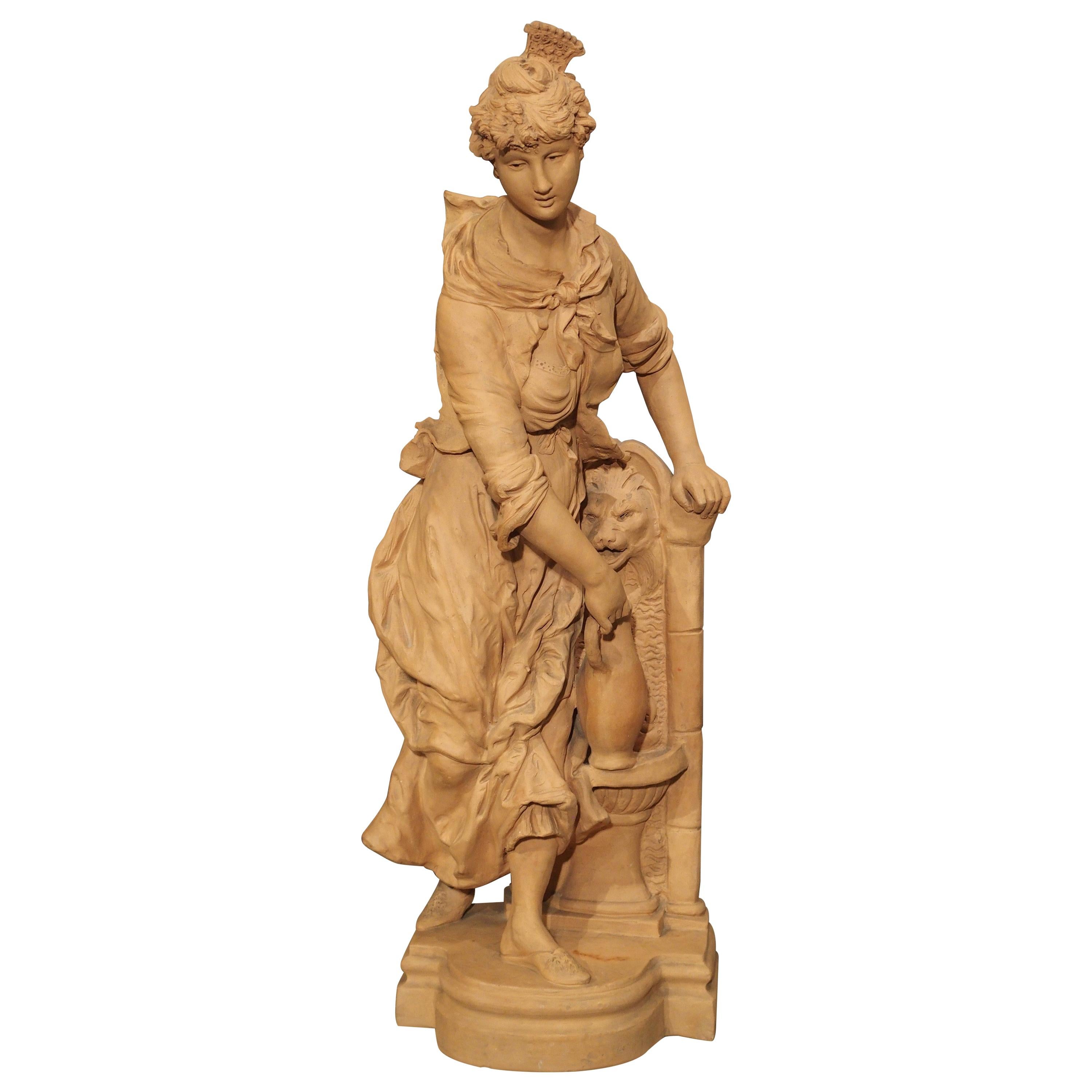 Französische Terrakotta-Statue einer Frau an einem Brunnen aus dem 19. Jahrhundert