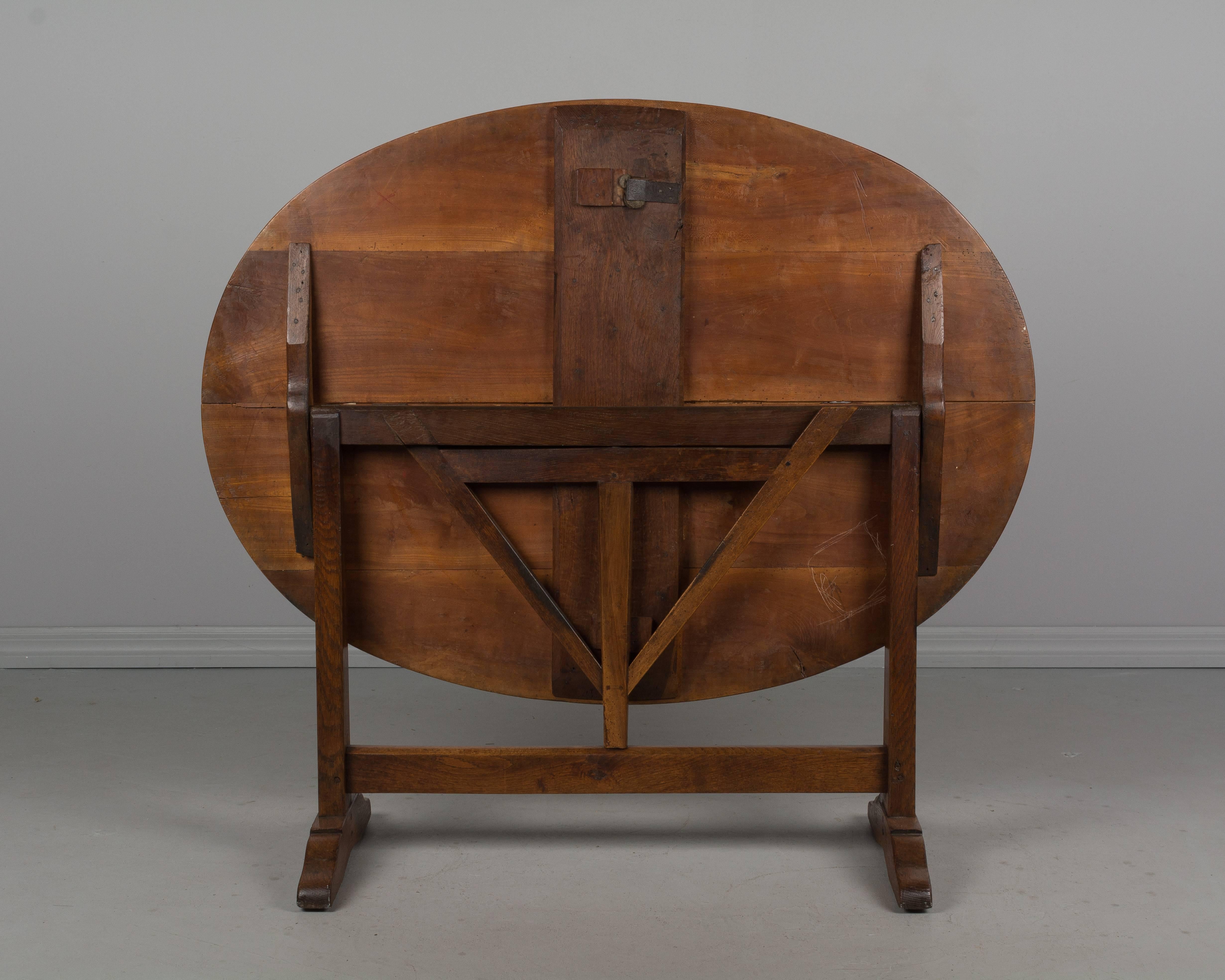 Hand-Crafted 19th Century French Tilt-Top Oval Table or Wine Tasting Table