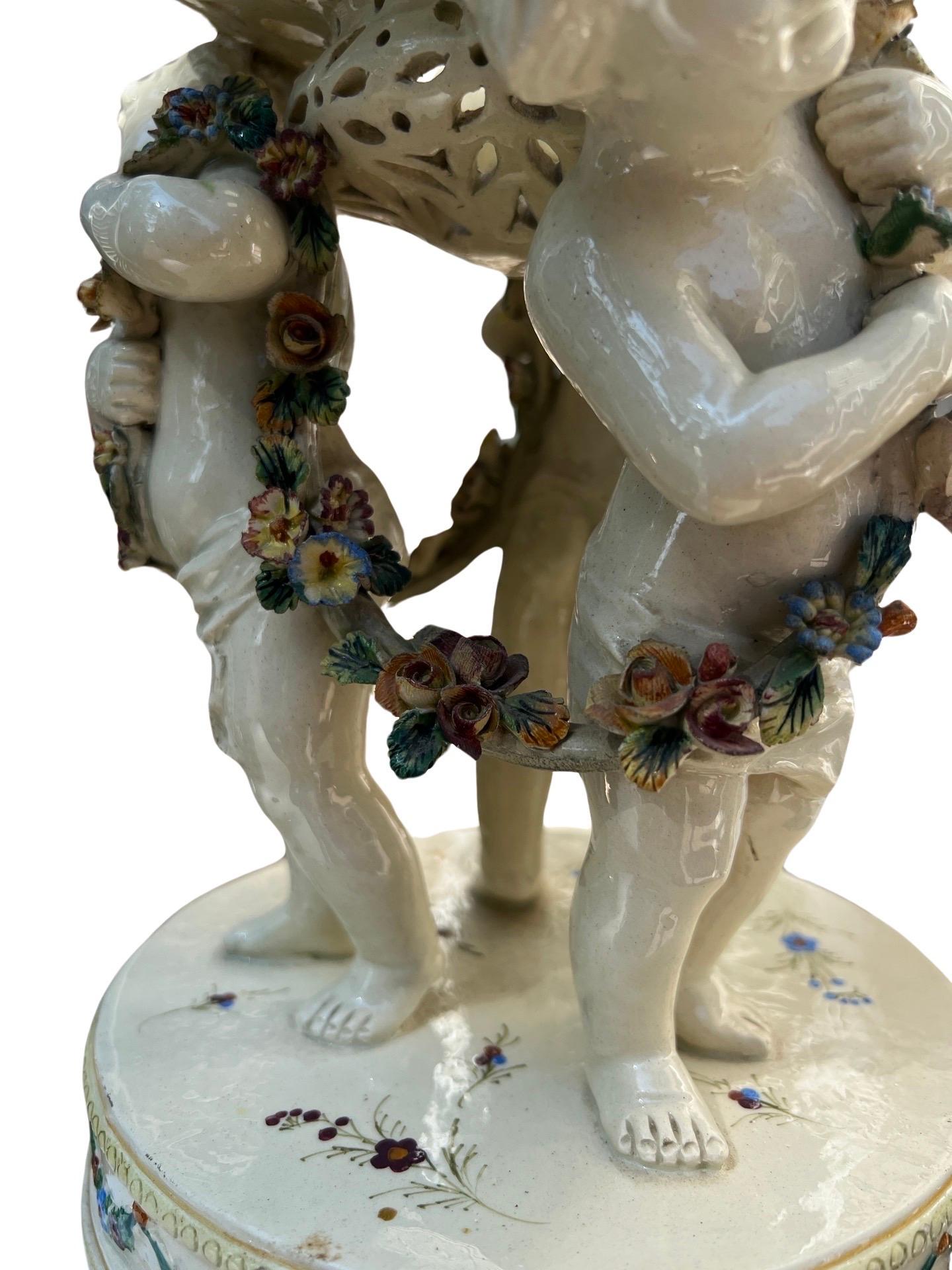 19th Century French Tin Glazed Creamware Centerpiece Adorned With Putti Supports For Sale 7