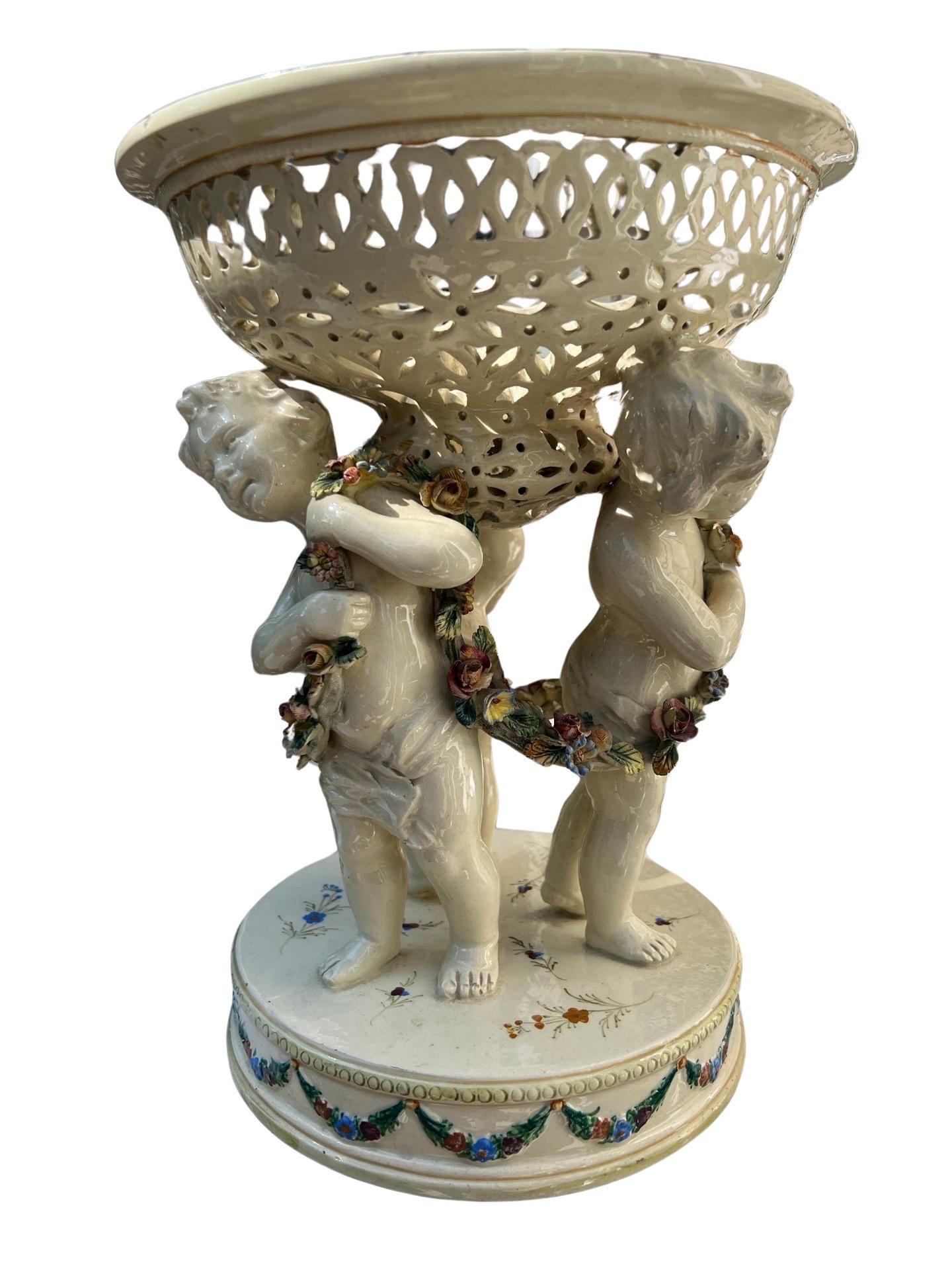 19th Century French Tin Glazed Creamware Centerpiece Adorned With Putti Supports In Good Condition For Sale In Atlanta, GA