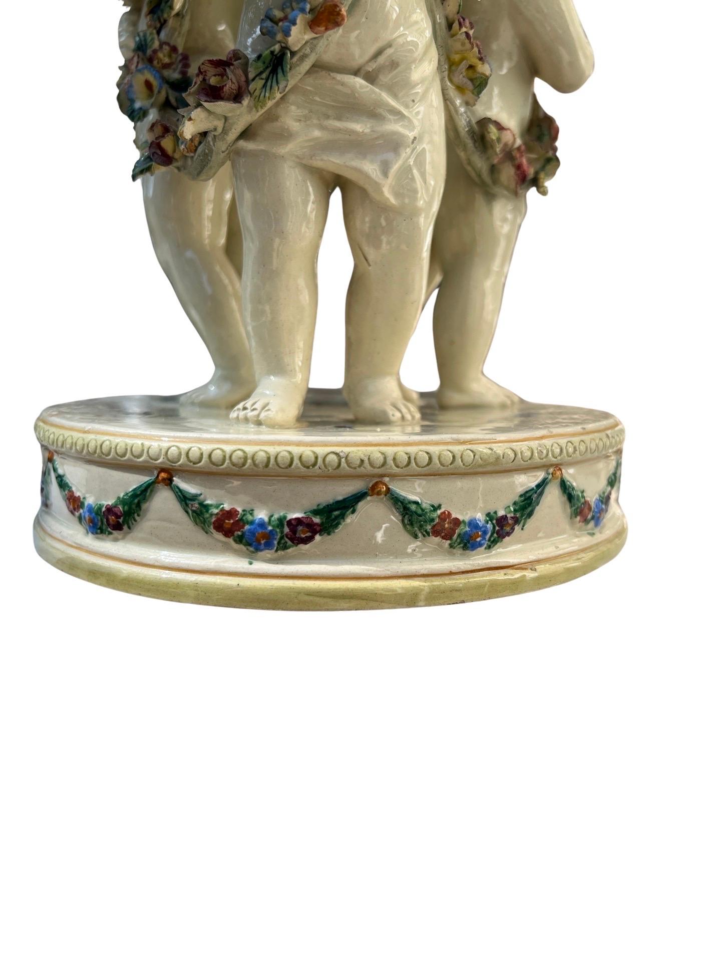 19th Century French Tin Glazed Creamware Centerpiece Adorned With Putti Supports For Sale 1