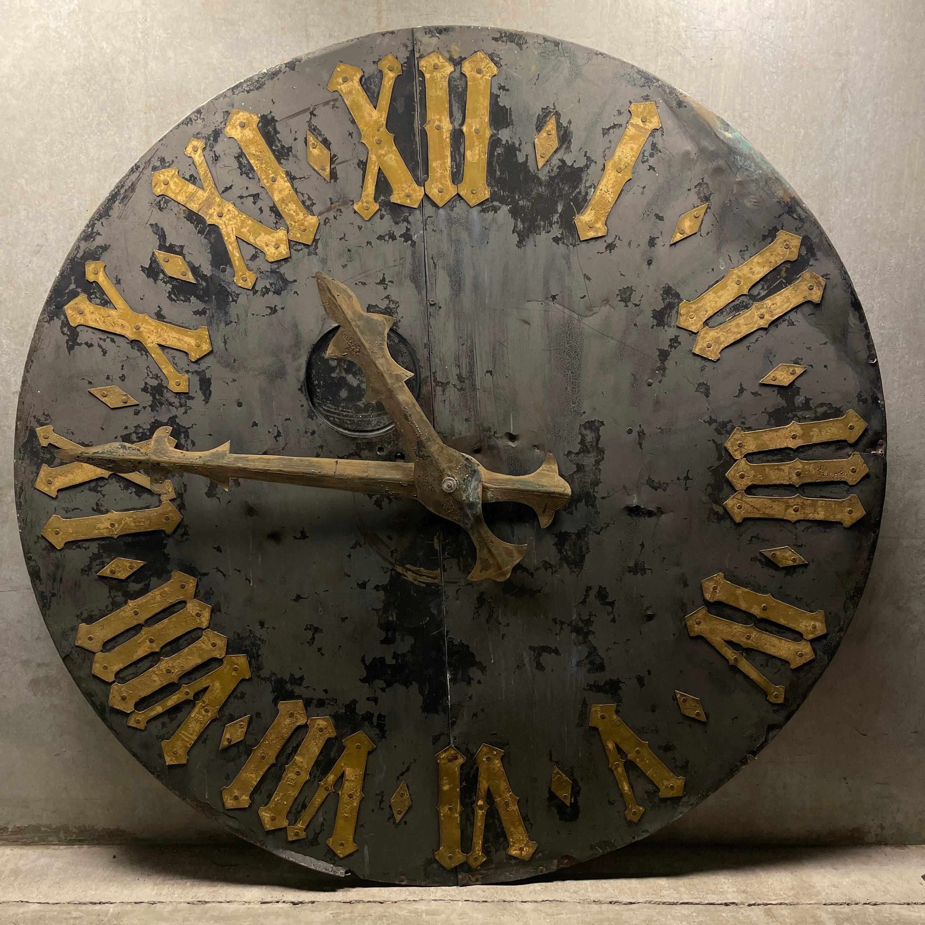 A very impressive large clock face from a tower in France.  The surface is outstanding showing old black finish with gilded highlights.   Patina is great ..

Interesting that the material is heavy copper and details are subtle but perfect. 

Easy