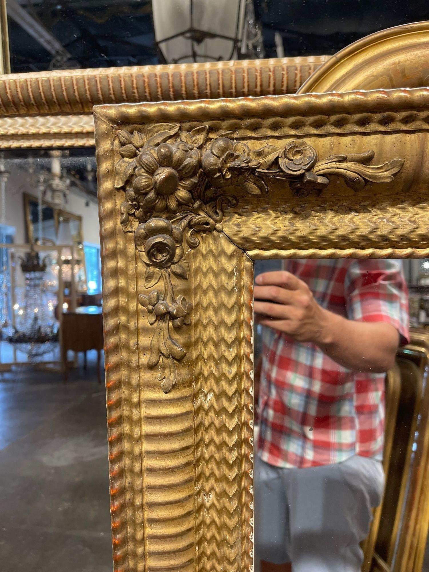 19th Century French Transitional Giltwood Reeded Mirror with Flowers In Good Condition In Dallas, TX