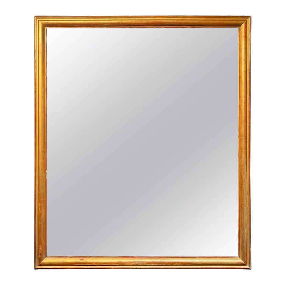 Espejo dorado de transición francés del siglo XIX en venta