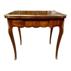 19th Century French Transitional Kingwood and Mahogany Inlaid Game Table