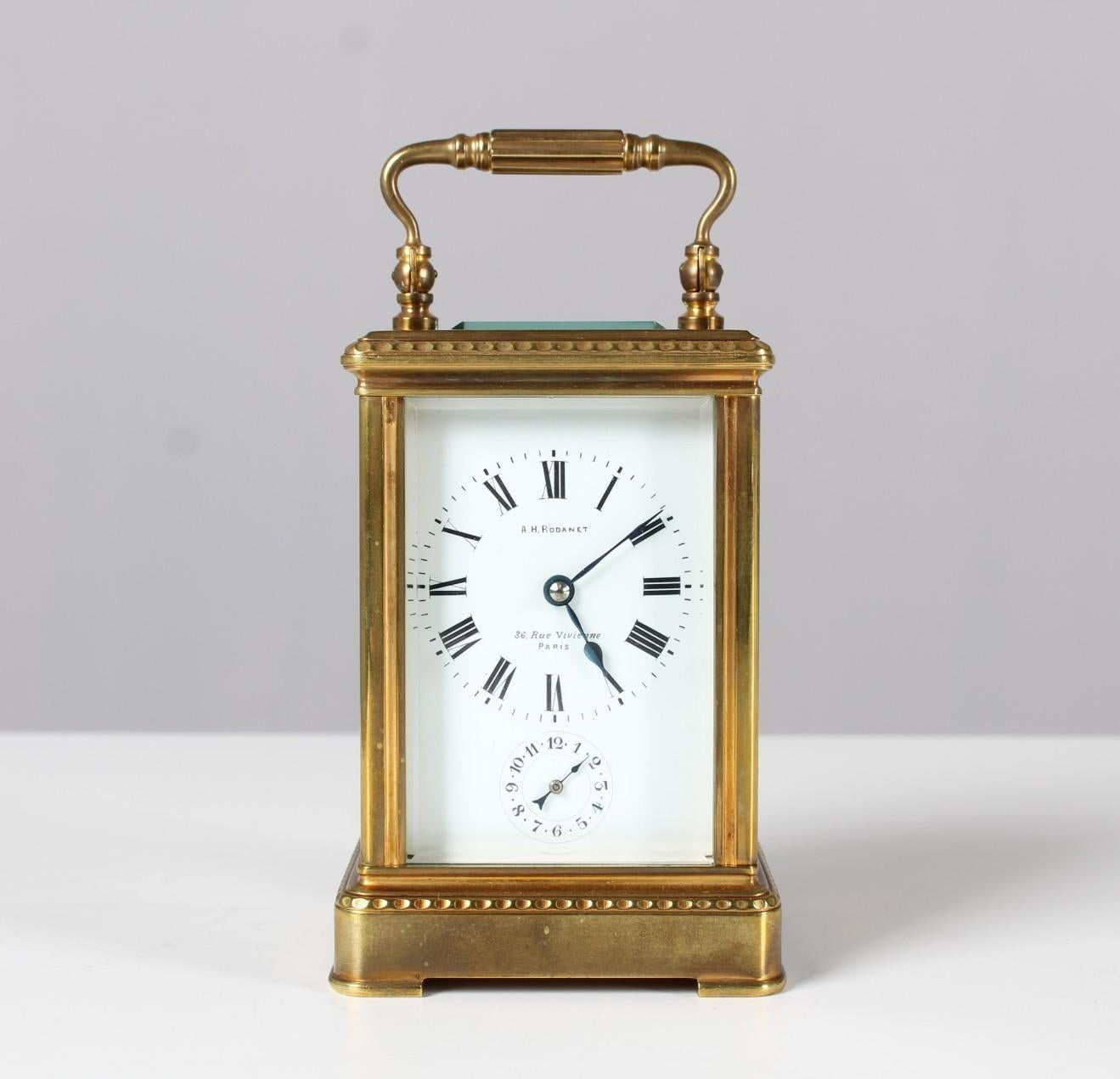 Antique french travel alarm clock

Paris
Brass, glass, enamel
around 1880

Dimensions: H x W x D: 12 x 8 x 7 cm

Description:
5-Sided glazed carriage clock. Carriage Clock with alarm strike on bell.

Enamel dial with black hands and Roman