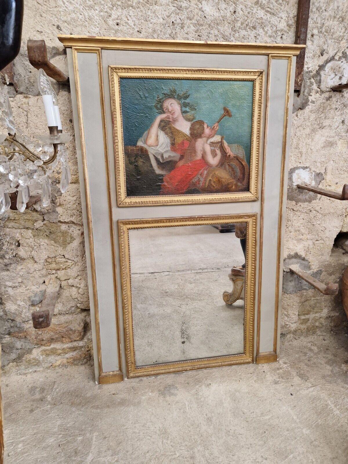 Antique Over Mantle Mirror, French grey Trumeau Mirror with Beautiful Oil Painting, 19th century period.
In the Louis XVI style,  Lacquered and Water Gilded, with pearls around the wood frame 
Foxed original Mirror plate and wood panel back.
A