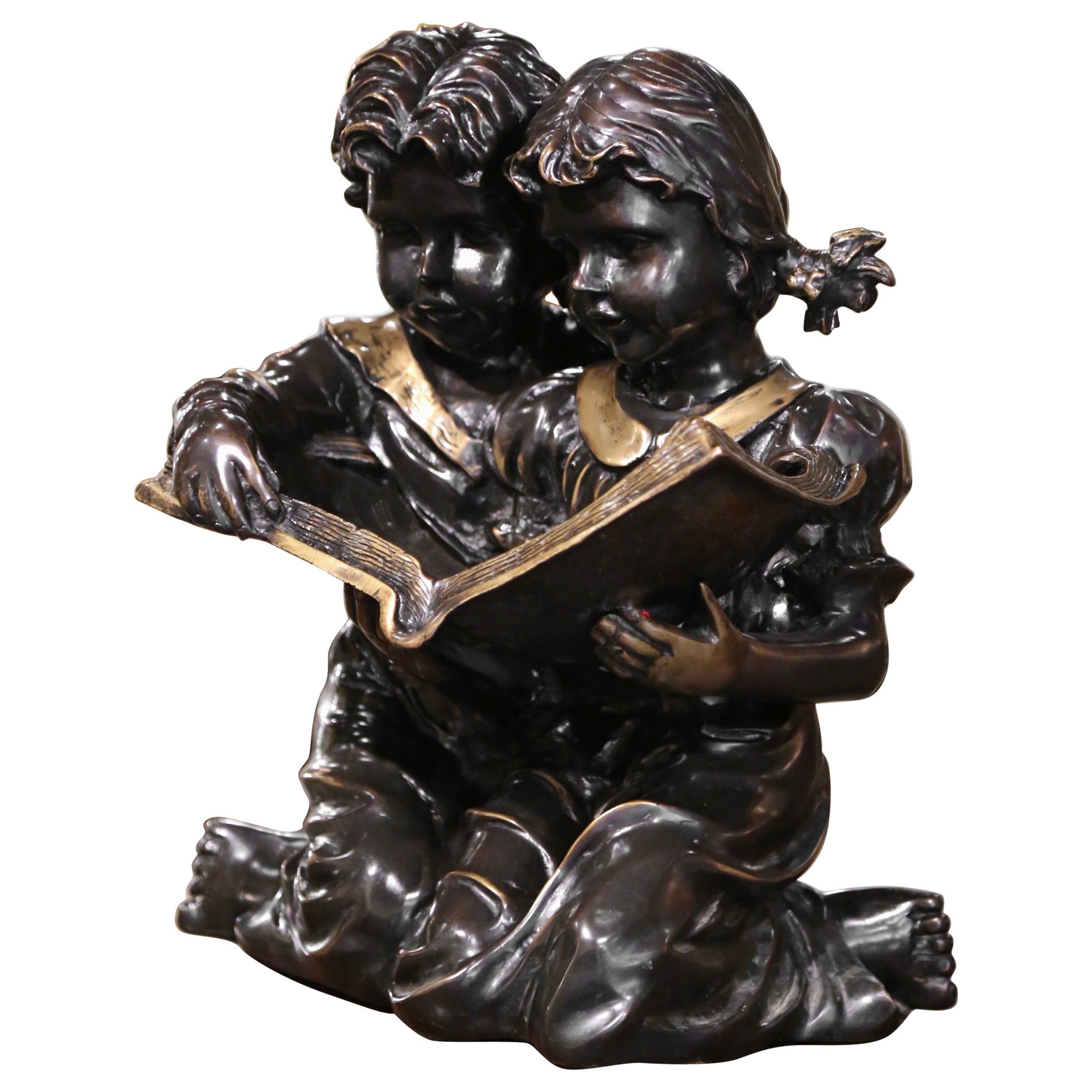 Composizione per bambini in bronzo bicolore francese del XIX secolo "Libro di lettura per bambini".