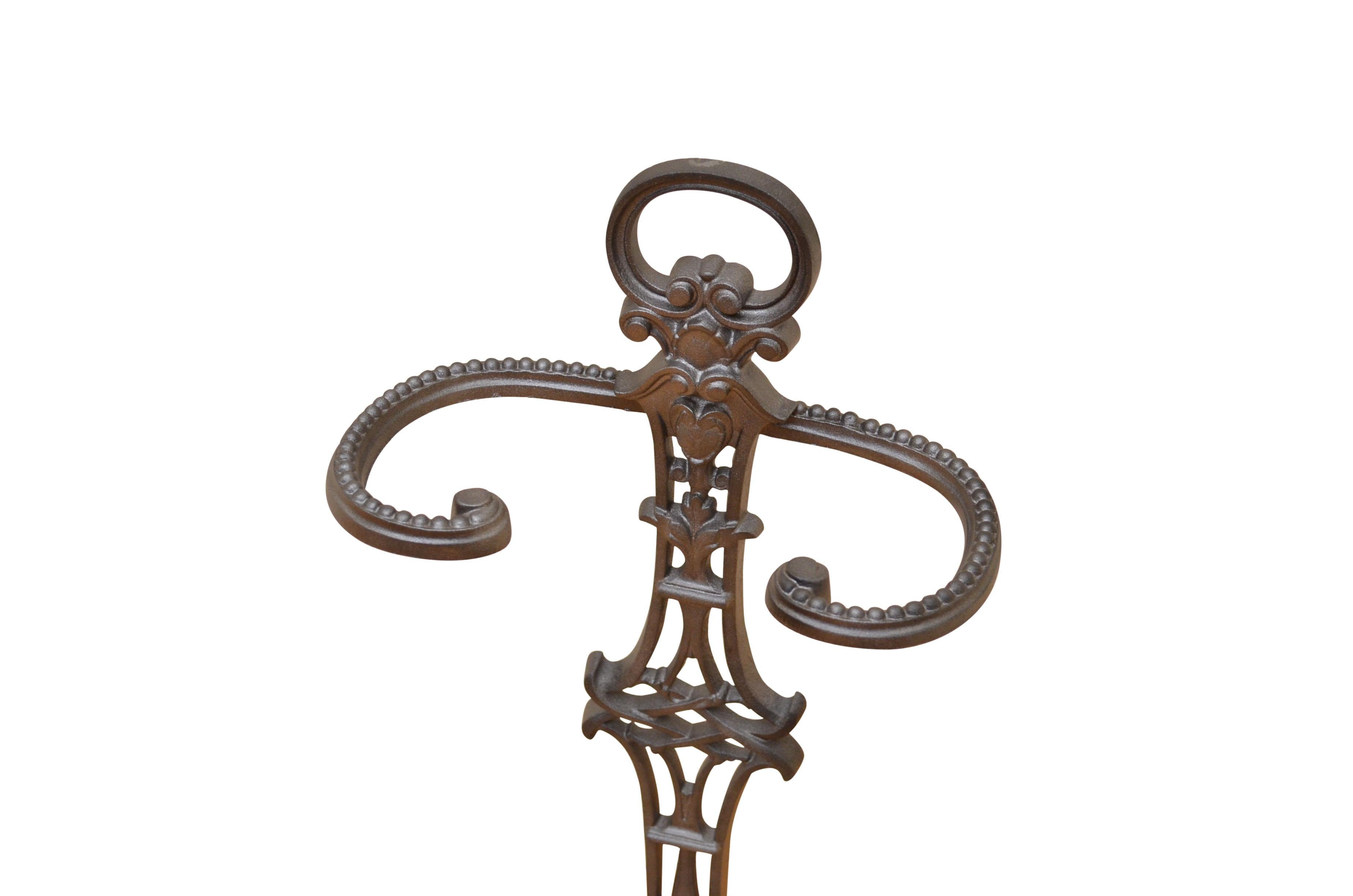 K0343 19th century French cast iron stick stand or fire irons stand with pierced decoration and shaped drip tray, all in excellent home ready condition. c1880
Measures: H 26