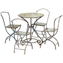 Used 19th Century French Verdigris Iron Pedestal Table and Four Matching Chairs