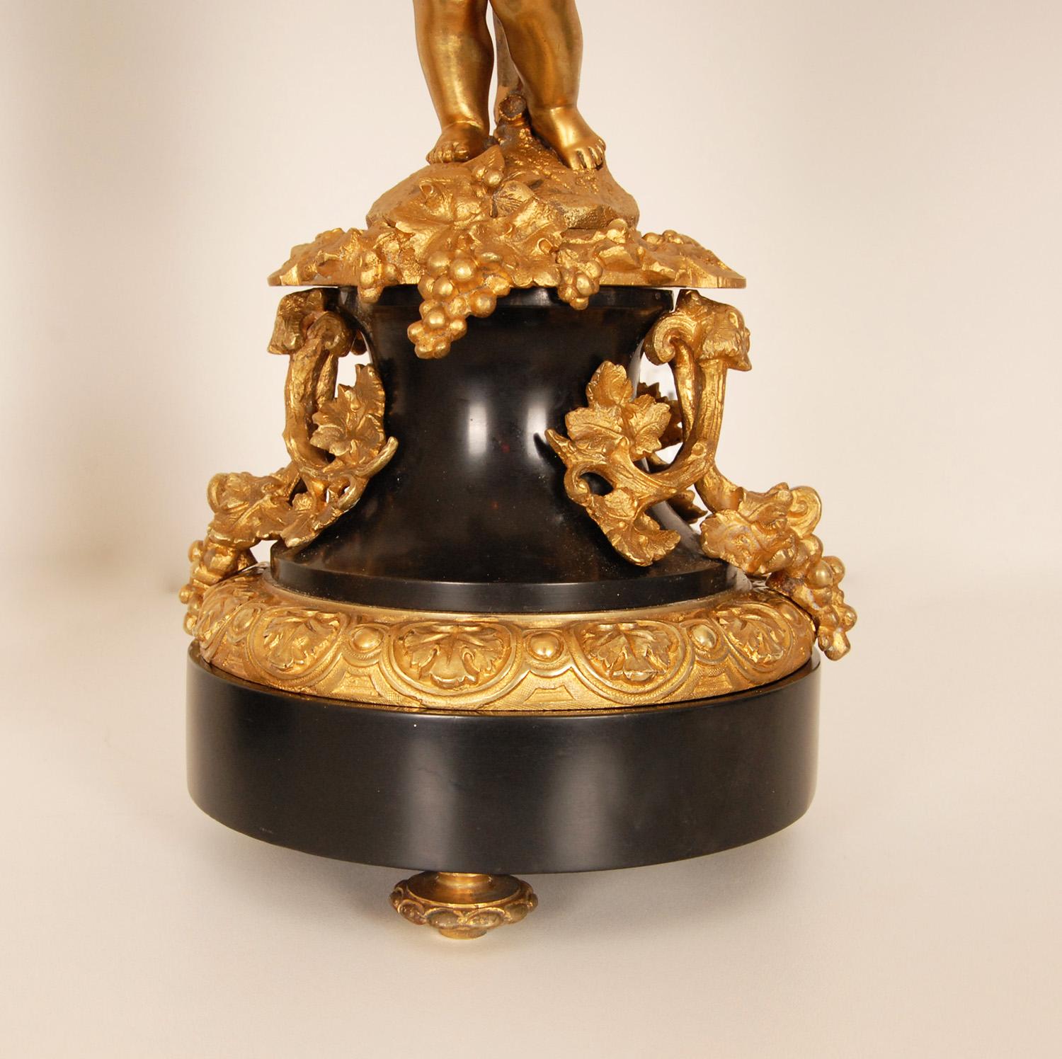 Antique French Gilt Bronze and black marble Candelabras Putto holding 6 light torches
Material: Gold gilded bronze and black marble.
Design: In the manner of Claude Michel Clodion, Henri Picard, Thomire and Francois Linke
Style: French, Antique,