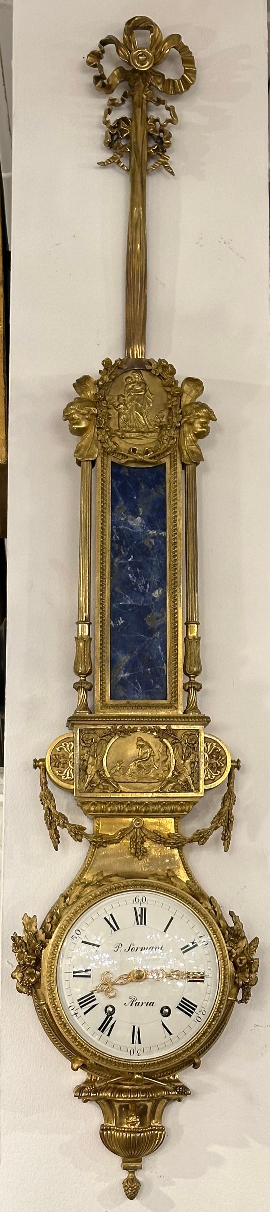 Elegant wall clock by Paul Sormani, in blue lapis lazuli and gilt bronze ormolu. 
 Paul Sormani was a famed French 19th century cabinetmaker, renown for his production of magnificent luxury furniture in the style of Louis XIV, Louis XV and Louis