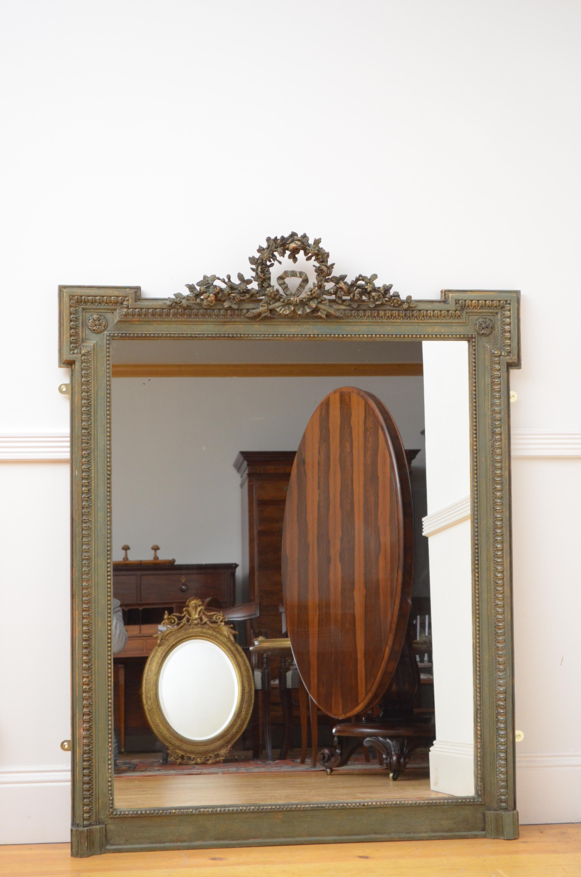 K0055 very attractive olive green wall mirror, having original glass with some foxing in gilded and green painted frame with centre crest to the top. This antique mirror is in excellent home ready condition, circa 1880
Measures: H 54.5
