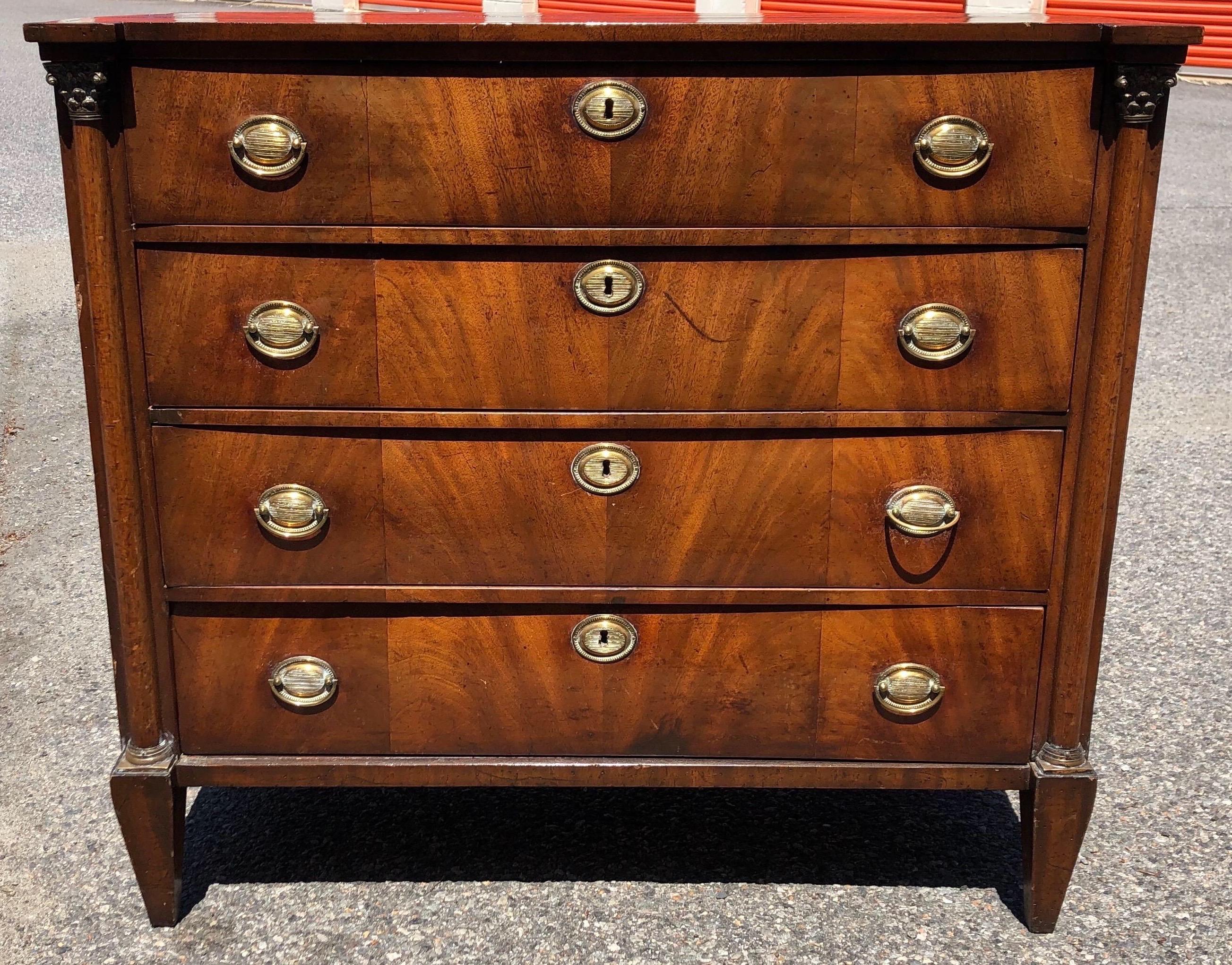 19th century French empire walnut chest with original pulls. Drawers centered between columns with bronze capitals. Few old charming restorations throughout- see photos.