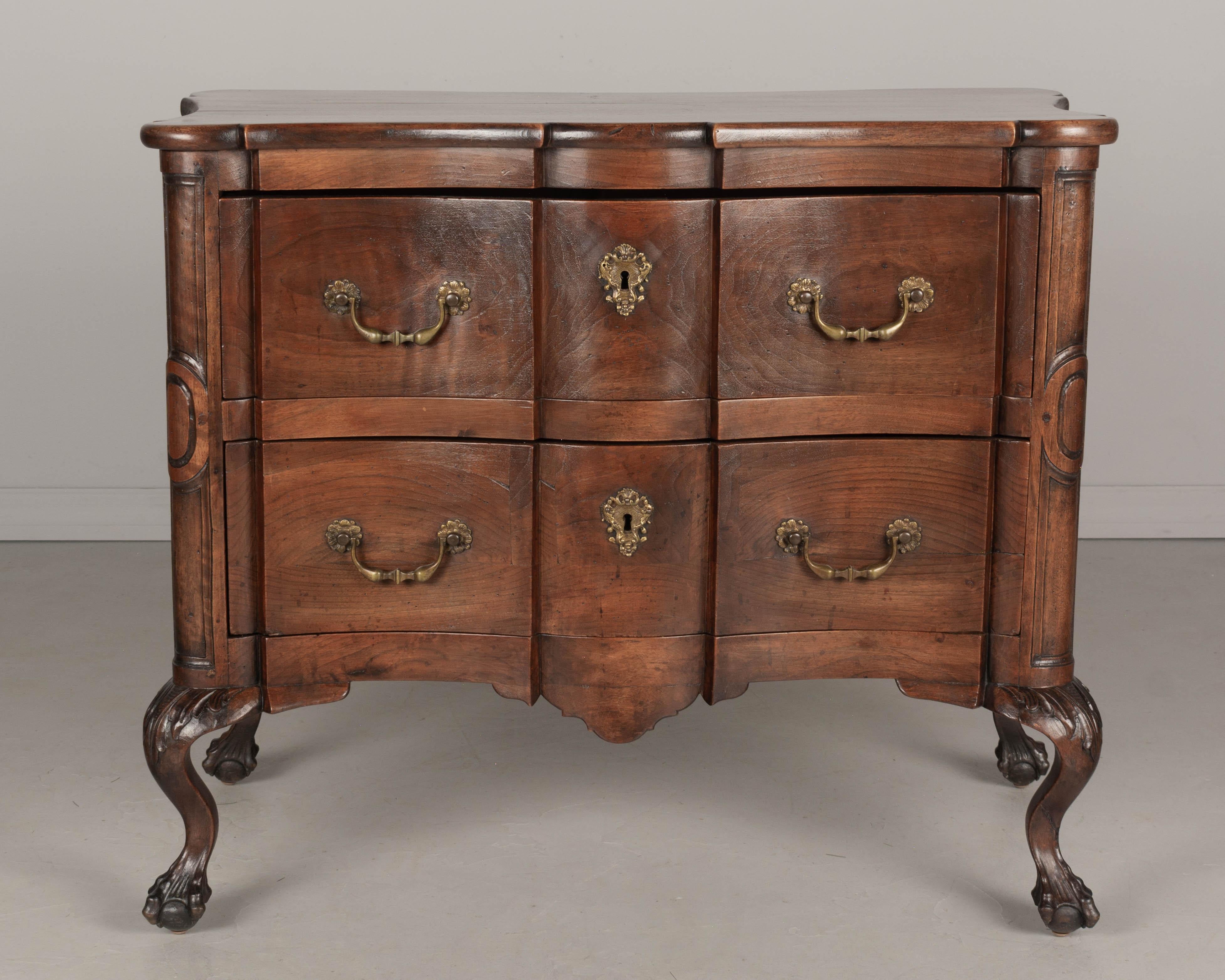 Hand-Carved 19th Century French Walnut Commode For Sale