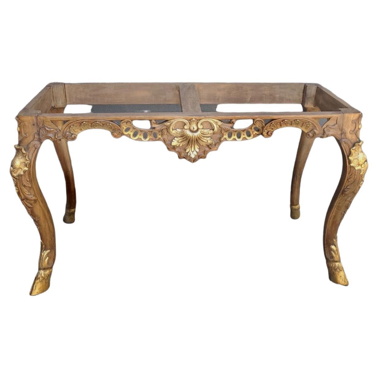 Finely-carved 19th Century French console with giltwood details. Hoofed feet. Marble top is original.