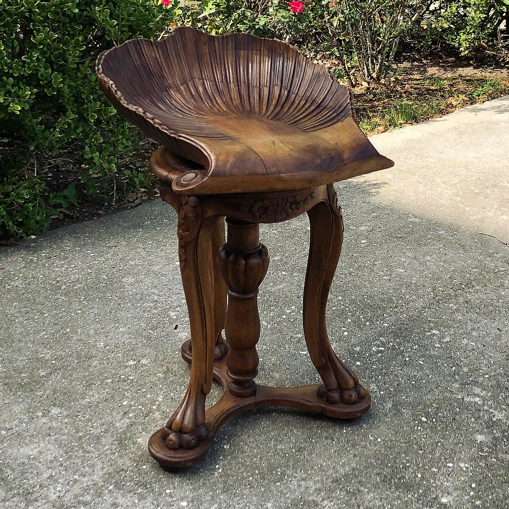 19th Century French Walnut Scallop Shell Musician's stool harks back to a time before digital music, cassettes, and radio ~ when music was all performed live. Families of affluence emphasized musical training from an early age, with instruments that