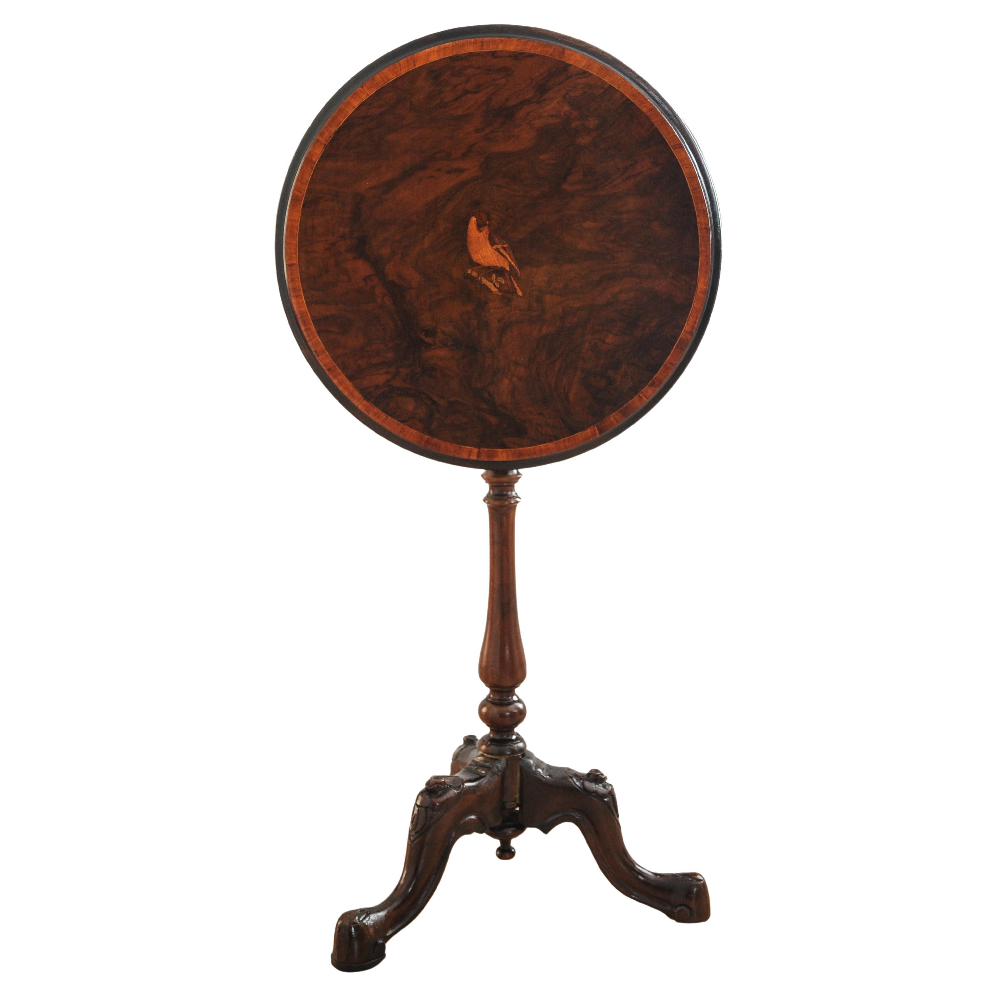 19th Century French Walnut Tilt Top Wine Table With A Central Inlaid Bird Motif Surrounded By A ​Satinwood Banded Top

With a Tripod Support Base, & Brass Button To Secure Top


