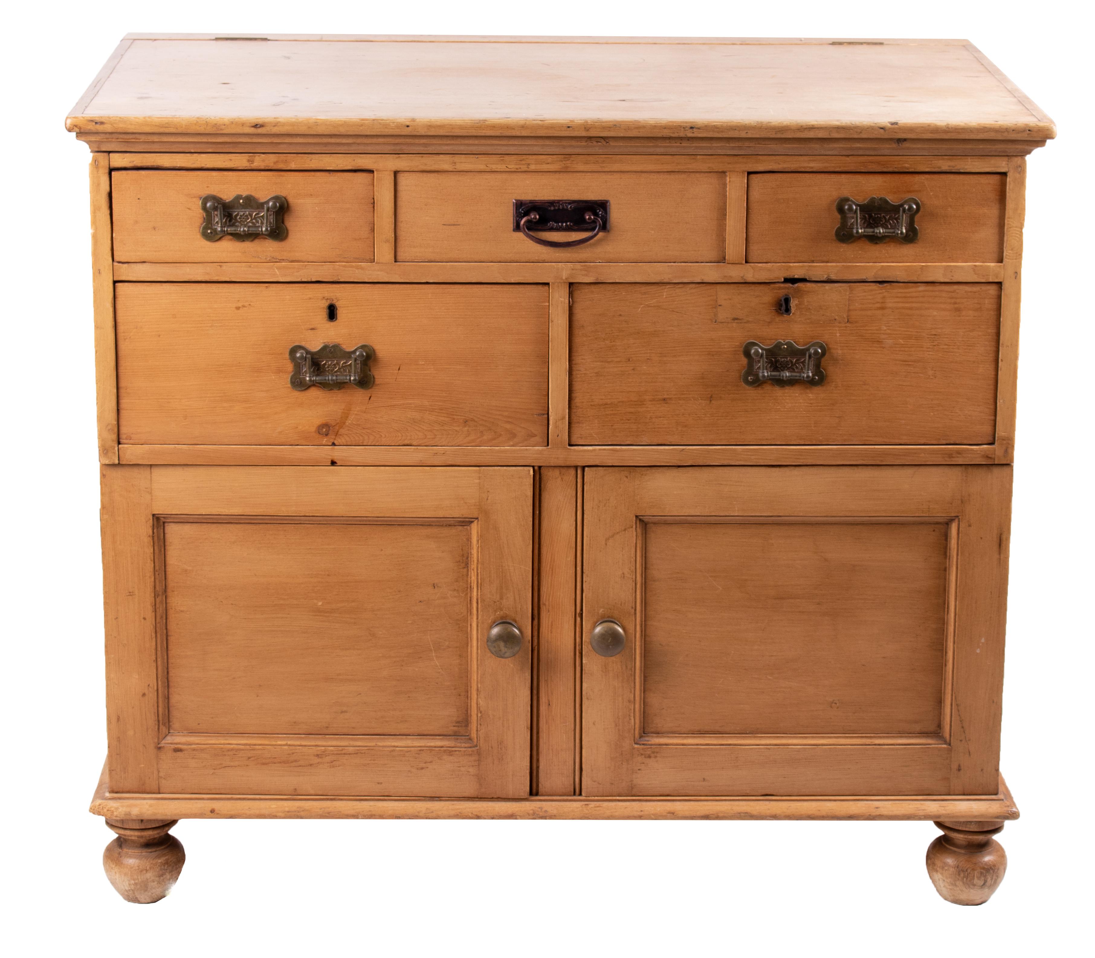 19th century French wash-room five-drawer chest with two panel doors.
