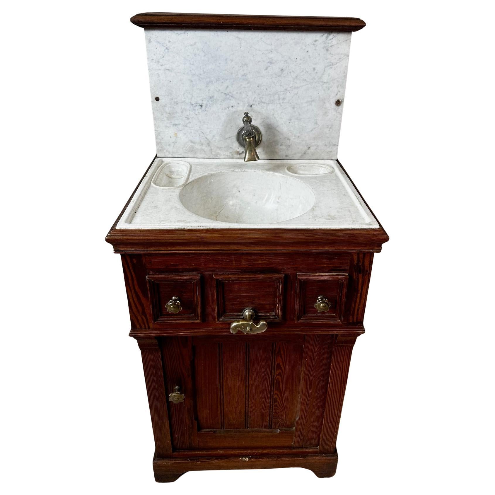 19th century French washstand in solid pitch pine, typical of cabin furniture