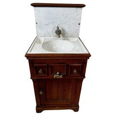 19th century French washstand in solid pitch pine, typical of cabin furniture
